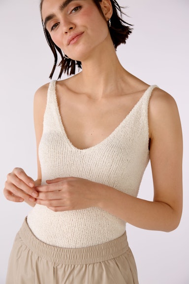 Knitted top with deep V-neck