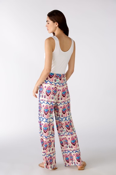 Fabric trousers in trendy print