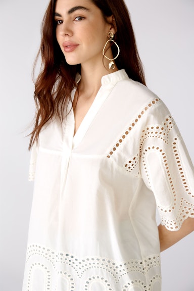 Tunic with perforated tip
