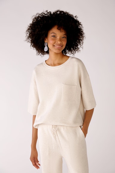 Knitted shirt with overcut shoulders