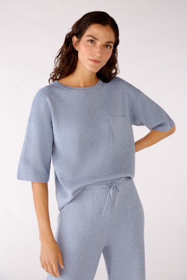 Knitted shirt with overcut shoulders