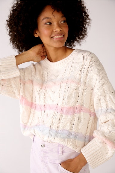 Knitted jumper  with cable structure