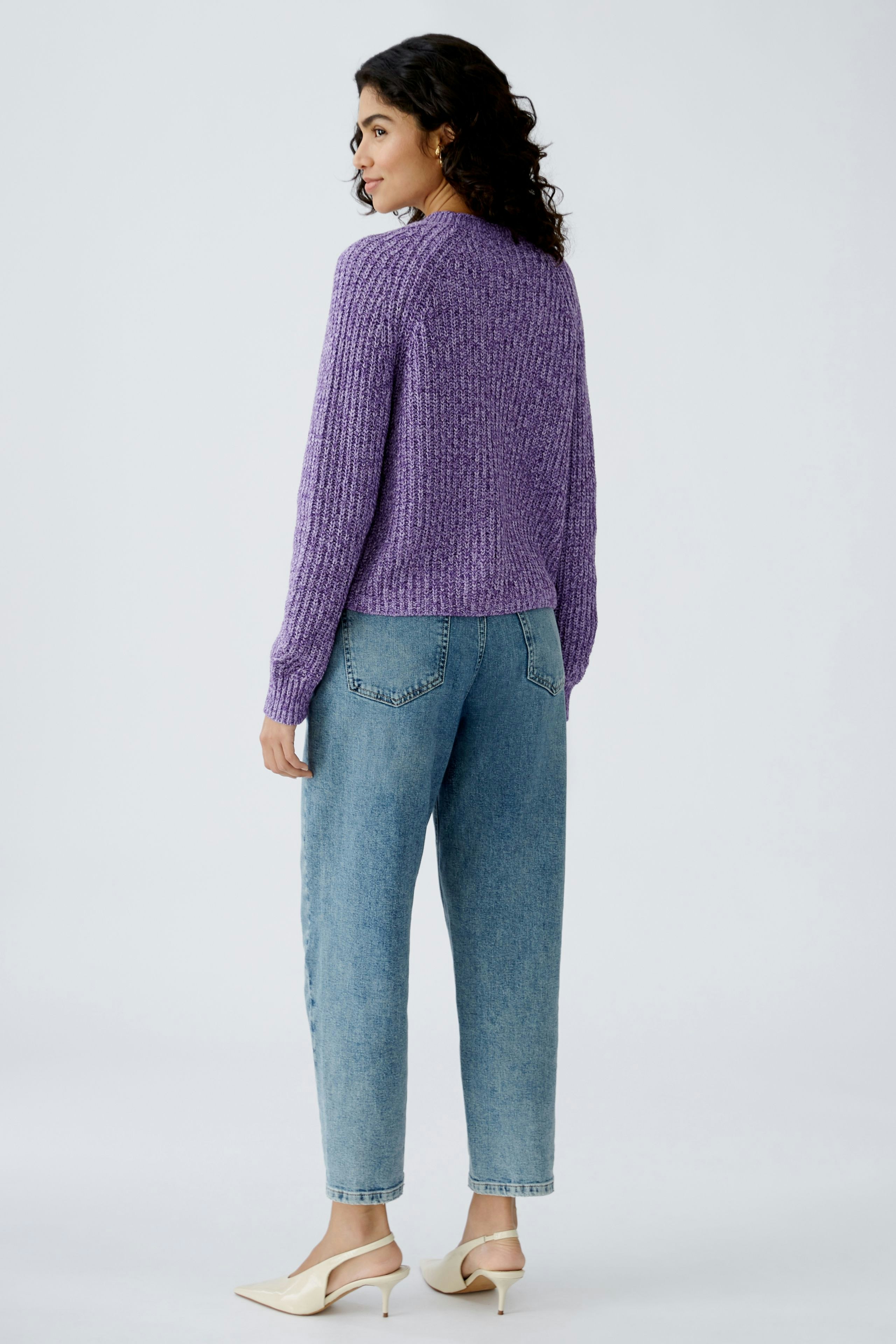 Stylish women's cardigan in purple, featuring a relaxed fit and textured knit design.