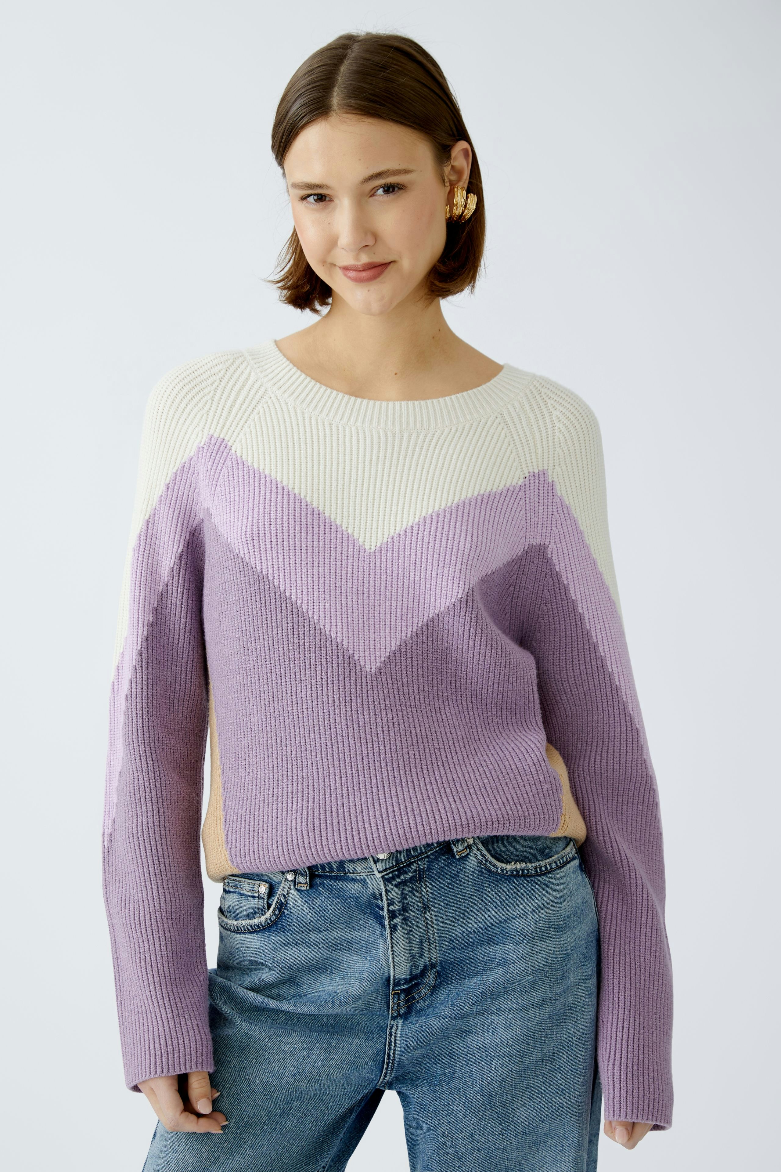 Stylish women's pullover in cream and lavender with a chevron pattern, perfect for casual wear.