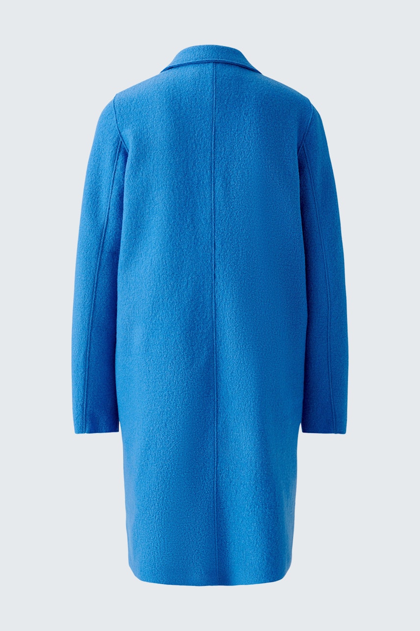 Stylish women's coat in vibrant blue, featuring a classic silhouette and soft texture.