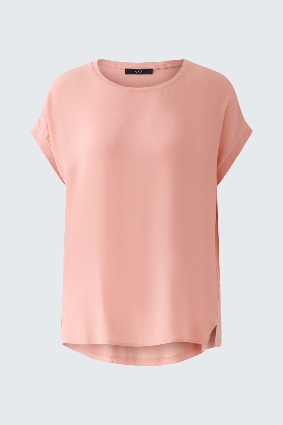 Light pink blouse shirt for women with a relaxed fit and short sleeves.