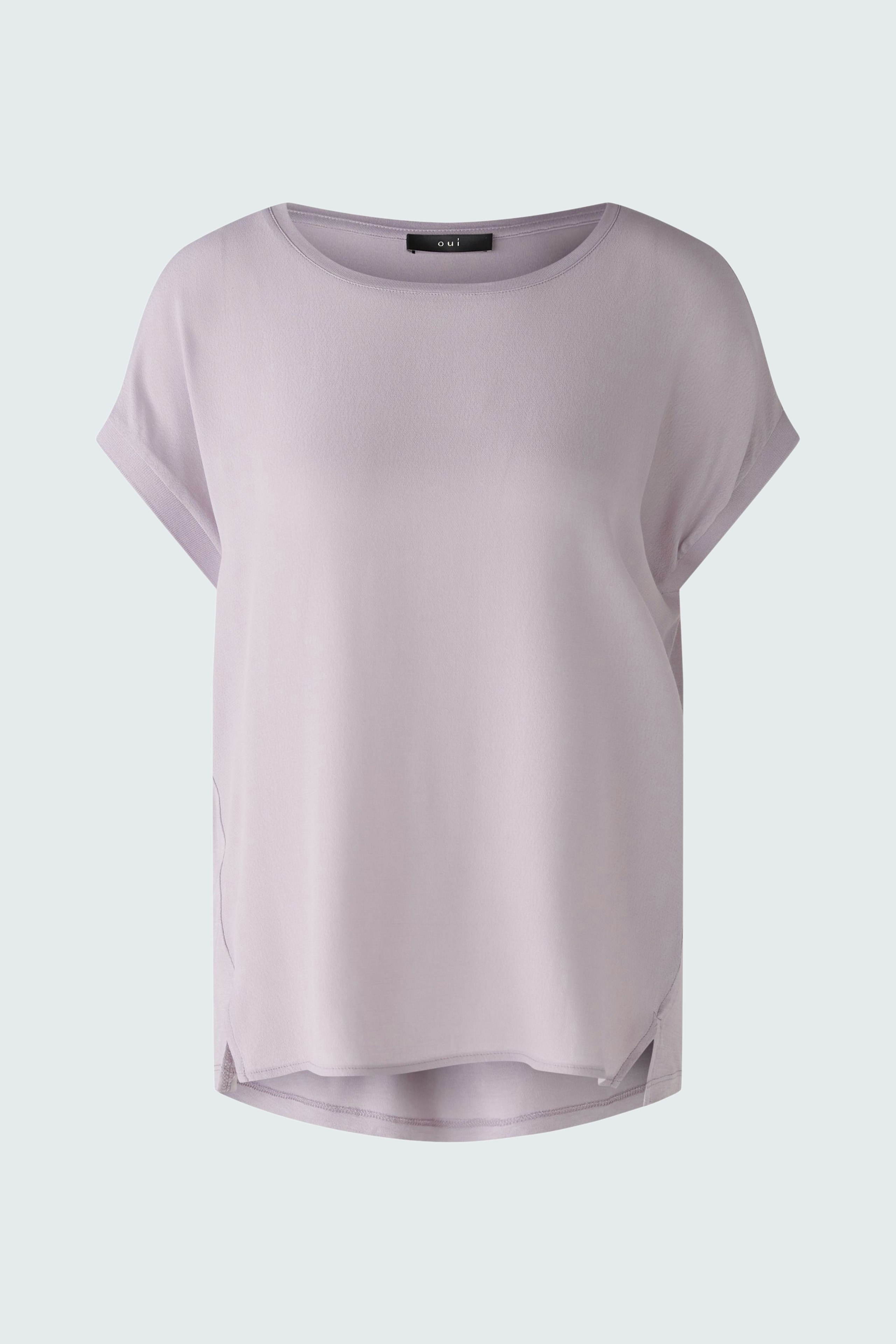 Light purple blouse shirt for women with a relaxed fit and short sleeves.