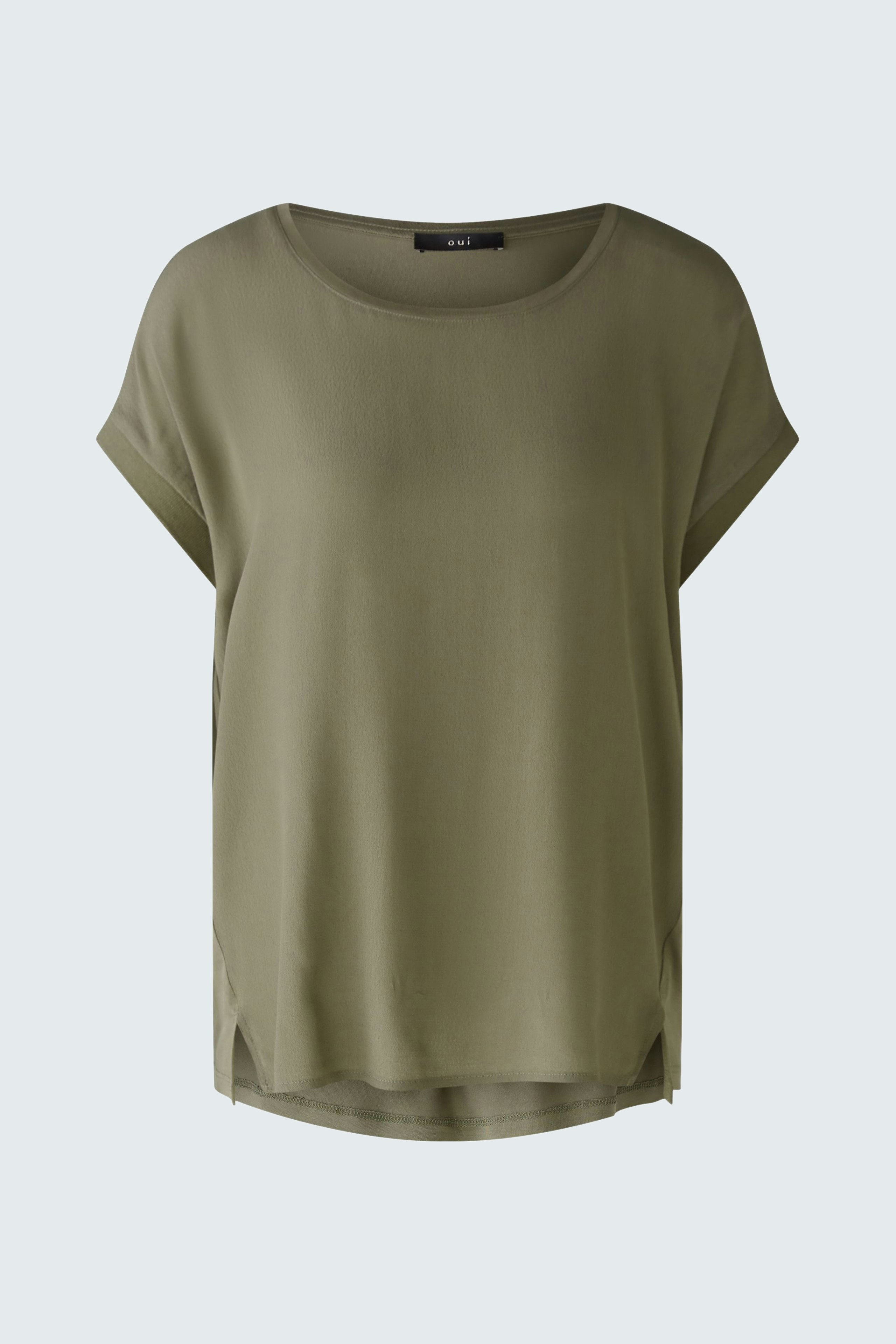 Casual women's blouse shirt in olive green with a relaxed fit and side slits.