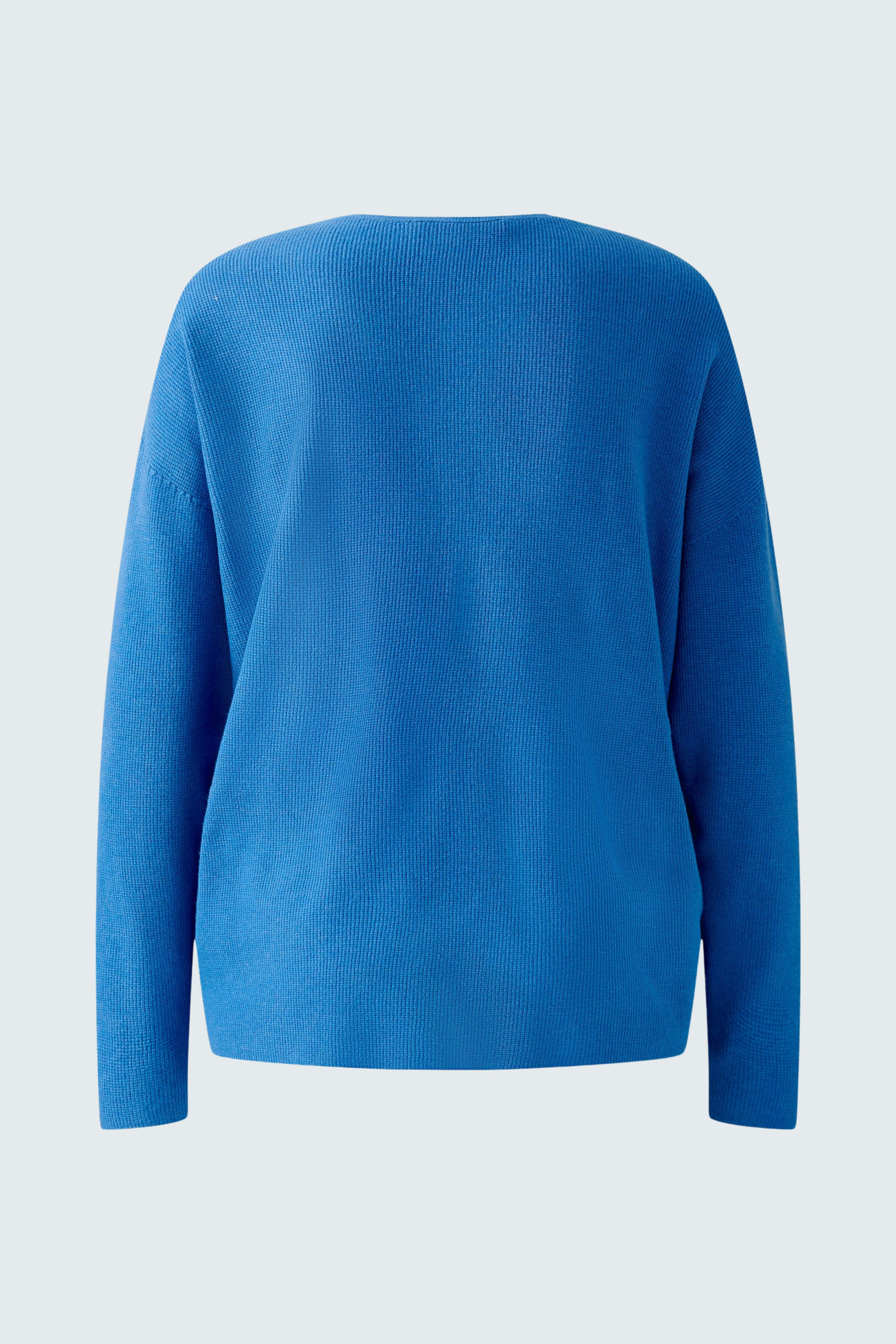 Soft blue pullover: Back view of a women's pullover, perfect for casual and stylish outfits.