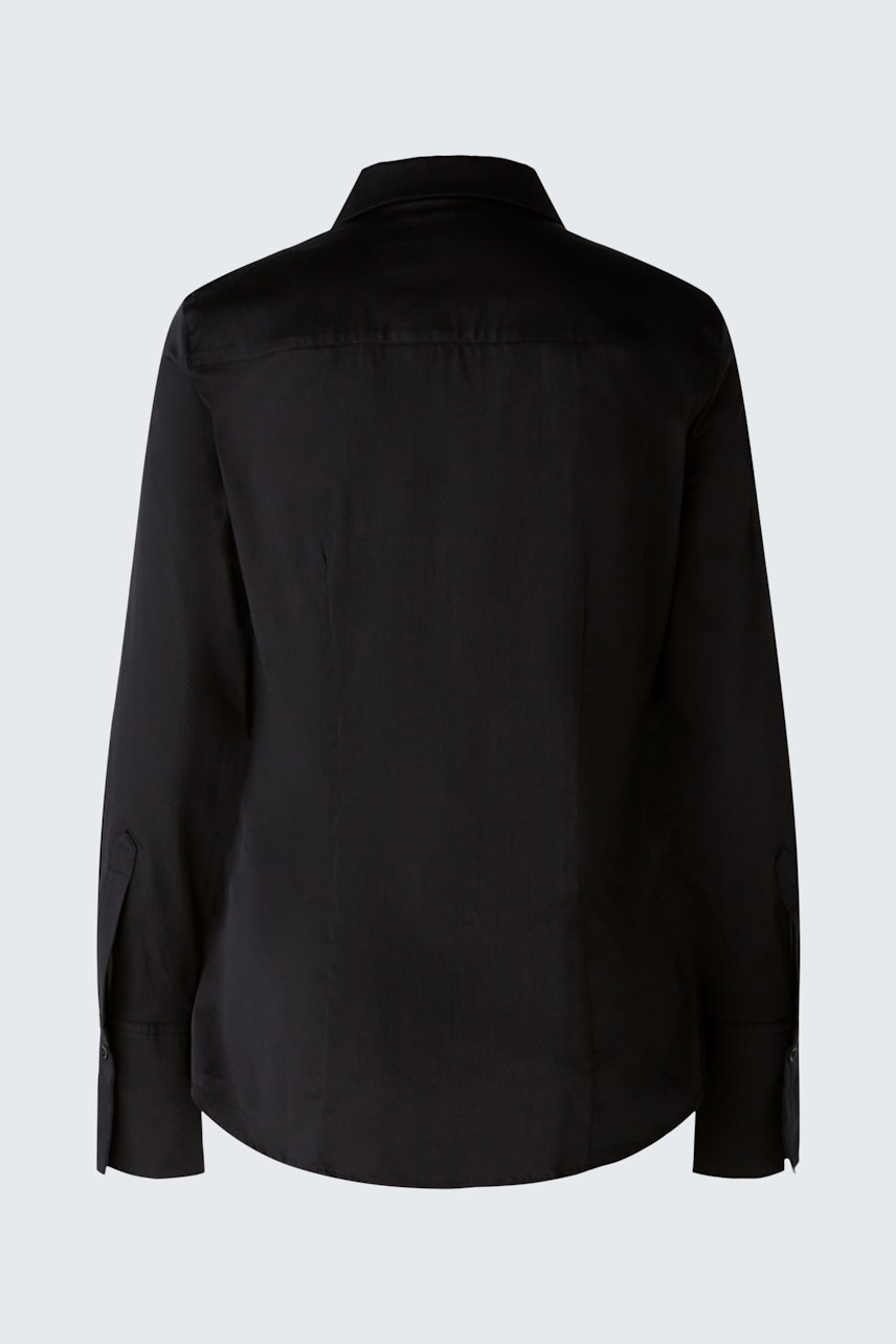 Elegant women's blouse in black, featuring a classic collar and long sleeves.