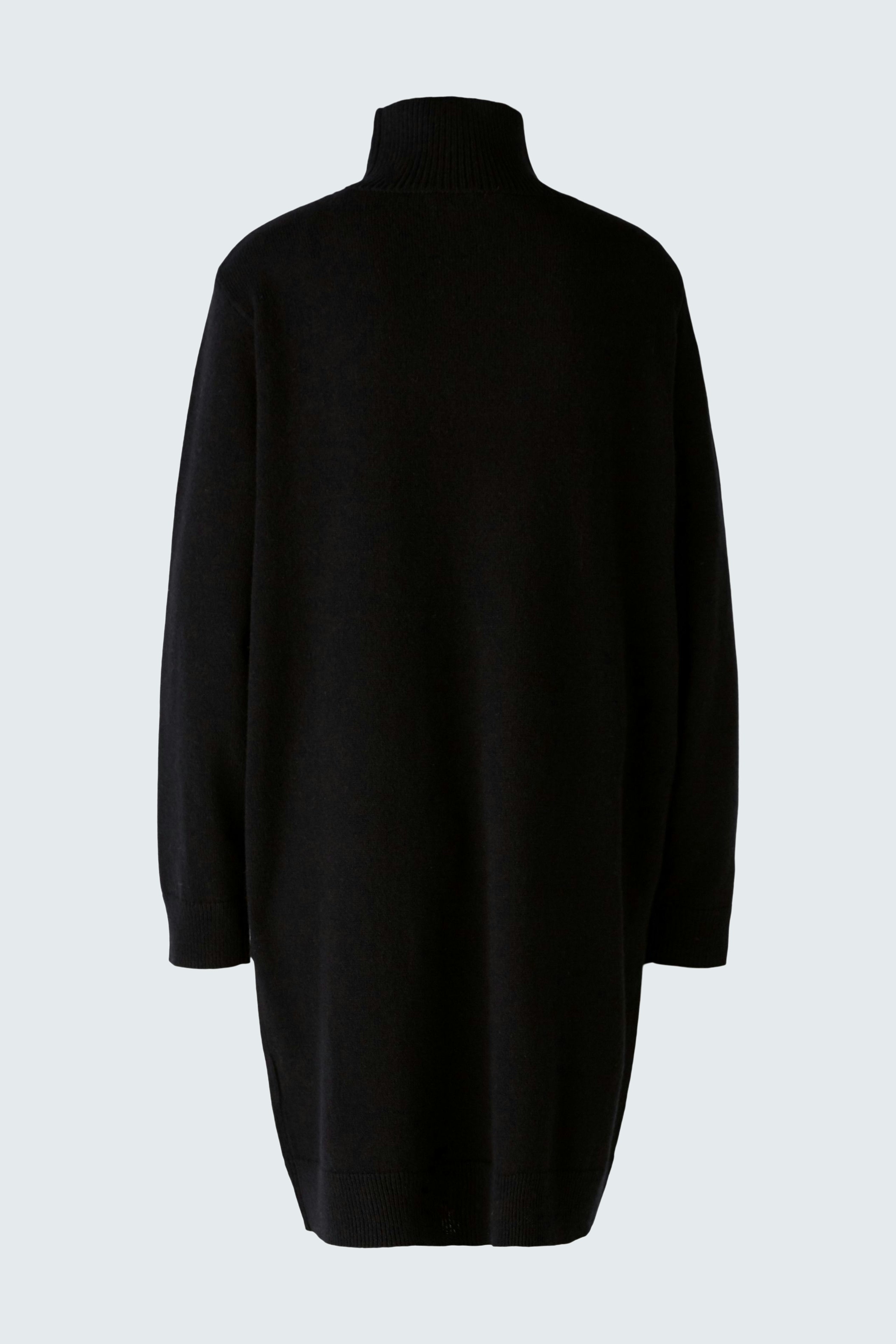 Elegant black dress with a high collar, perfect for stylish occasions.