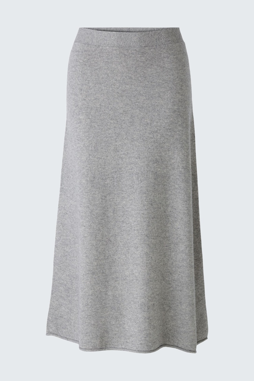 Elegant A-line skirt in soft gray fabric, perfect for versatile styling.