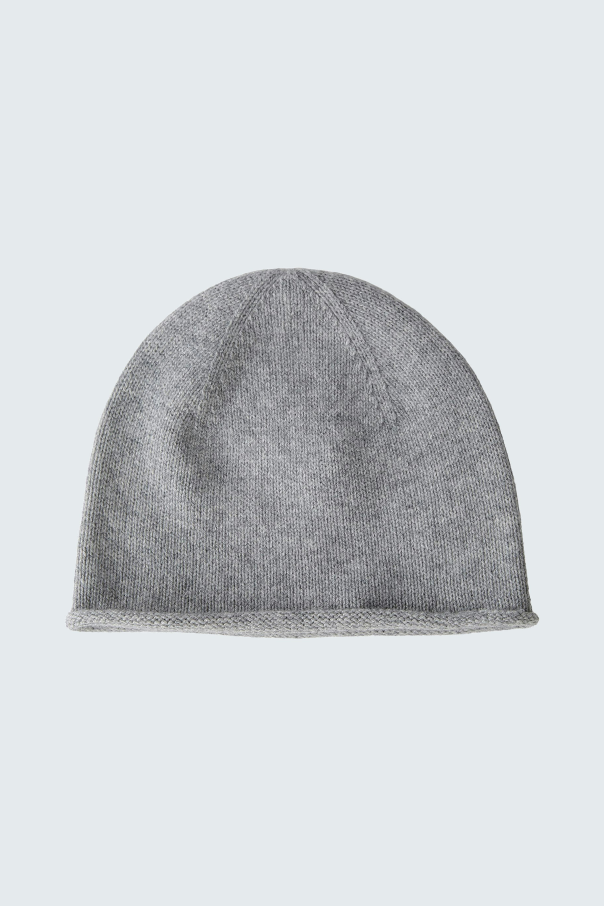 Stylish women's beanie: Soft gray knit hat, perfect for warmth and casual style.