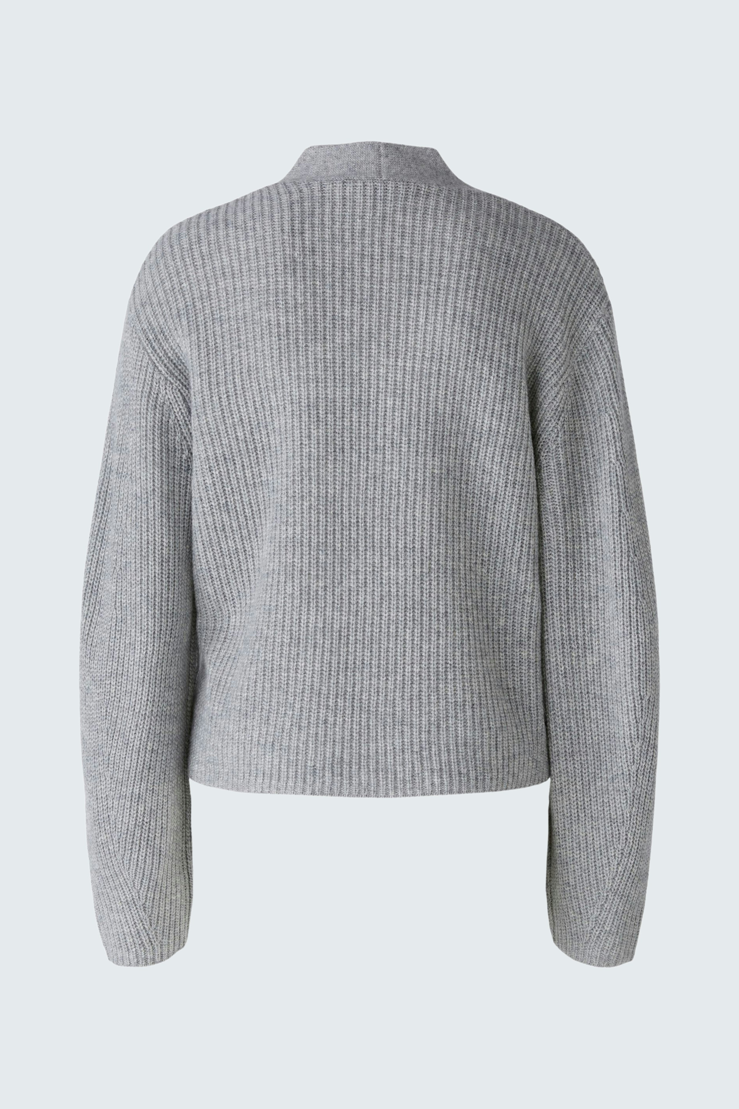 Stylish women's cardigan: A cozy gray knit cardigan with a relaxed fit, perfect for layering.