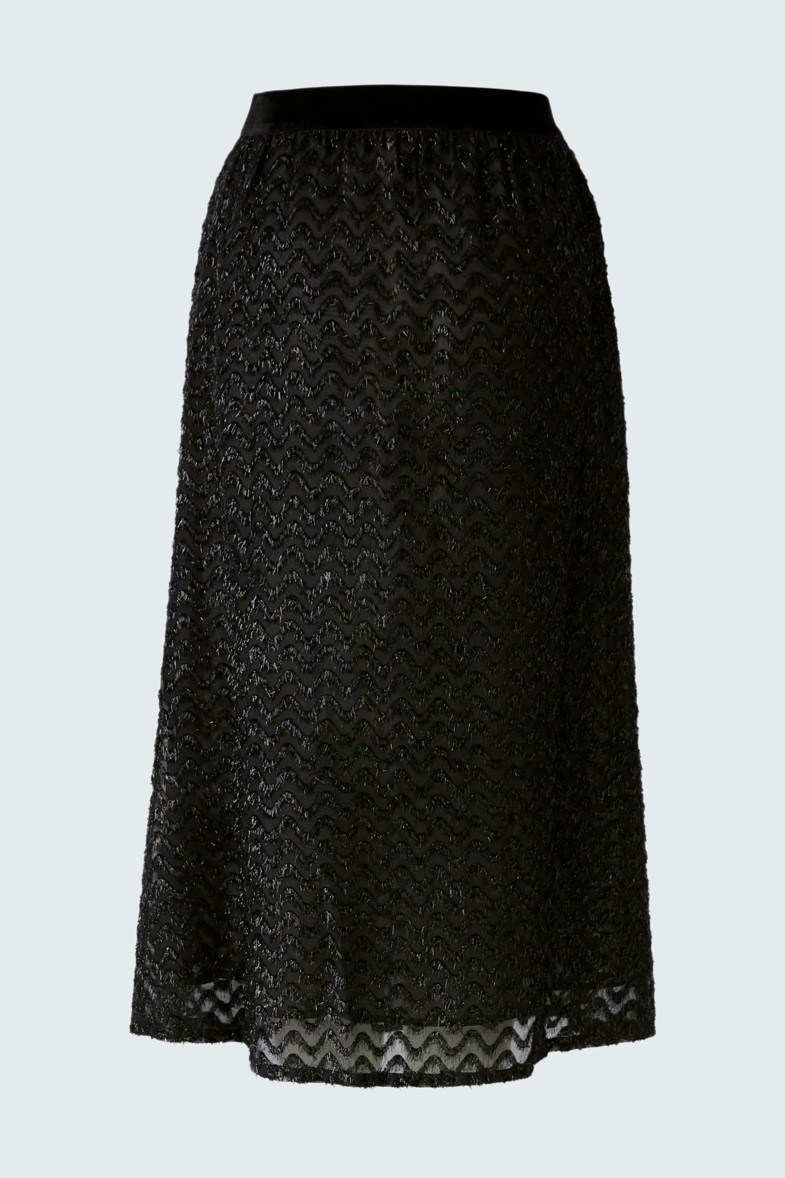 Elegant black skirt: A woman showcases a chic, flowing skirt with a subtle pattern, perfect for any occasion.