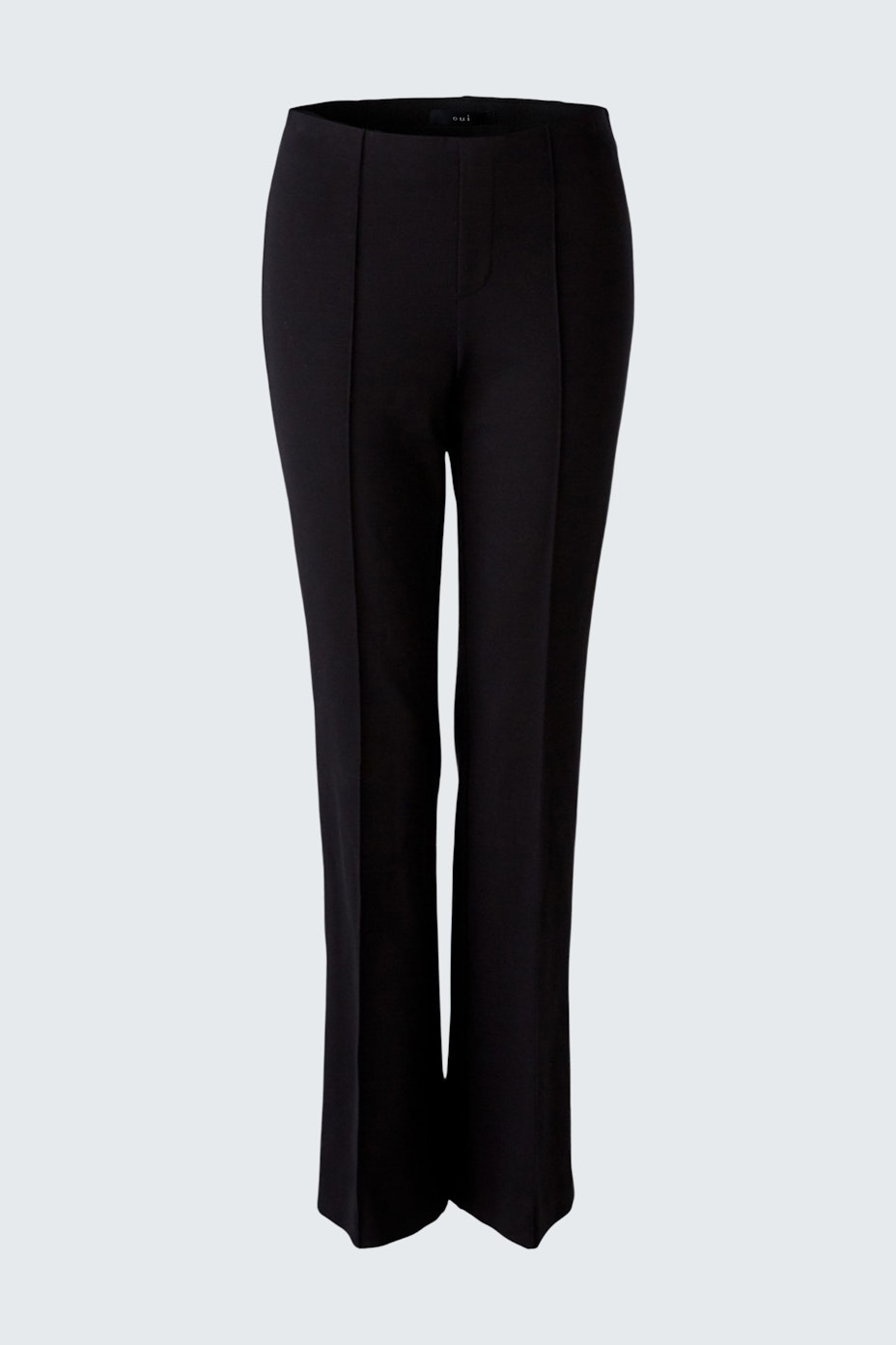 Elegant women's trousers: A woman in sleek black trousers with a tailored fit, perfect for any occasion.