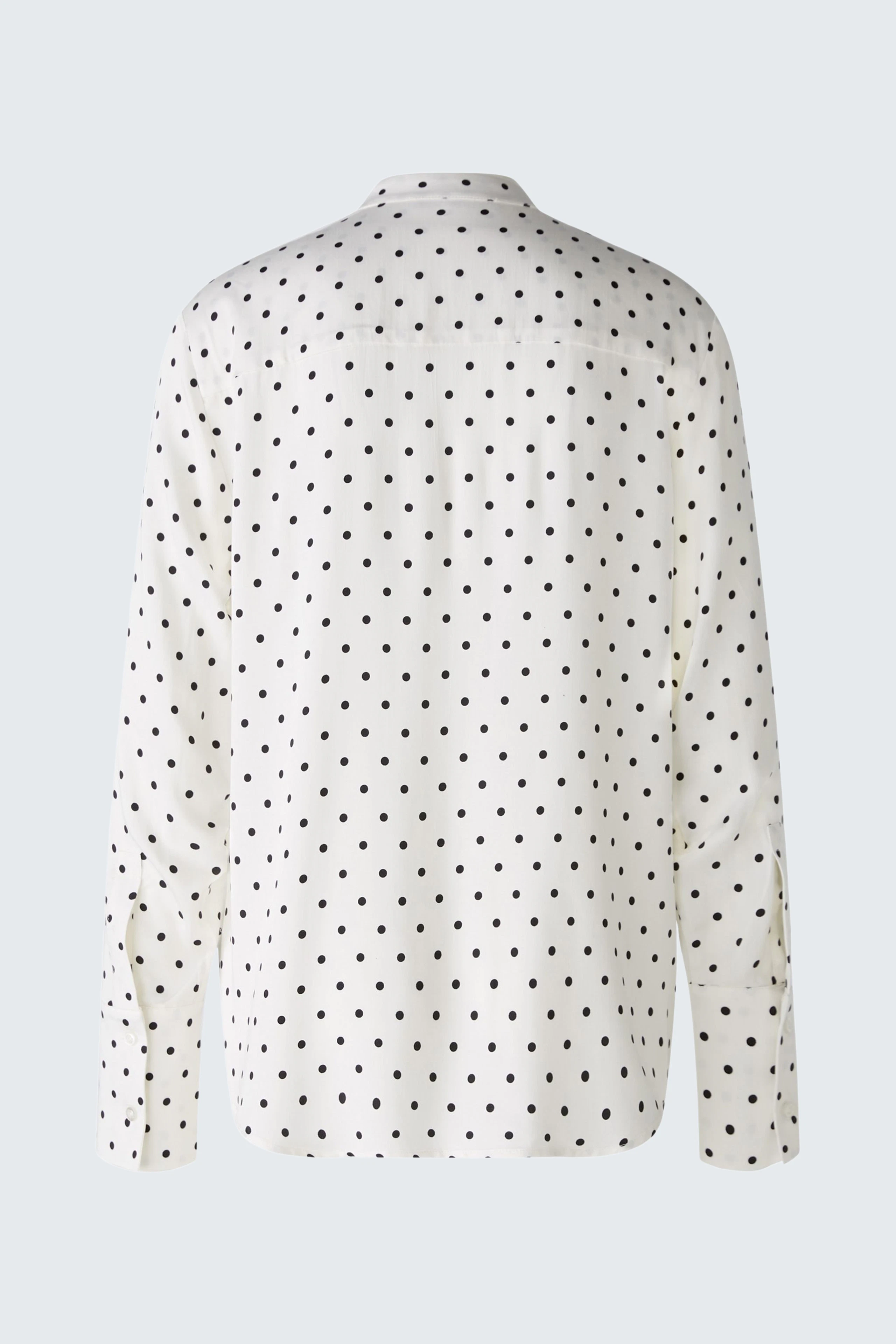 Chic women's blouse: Back view of a white blouse with black polka dots, perfect for stylish outfits.