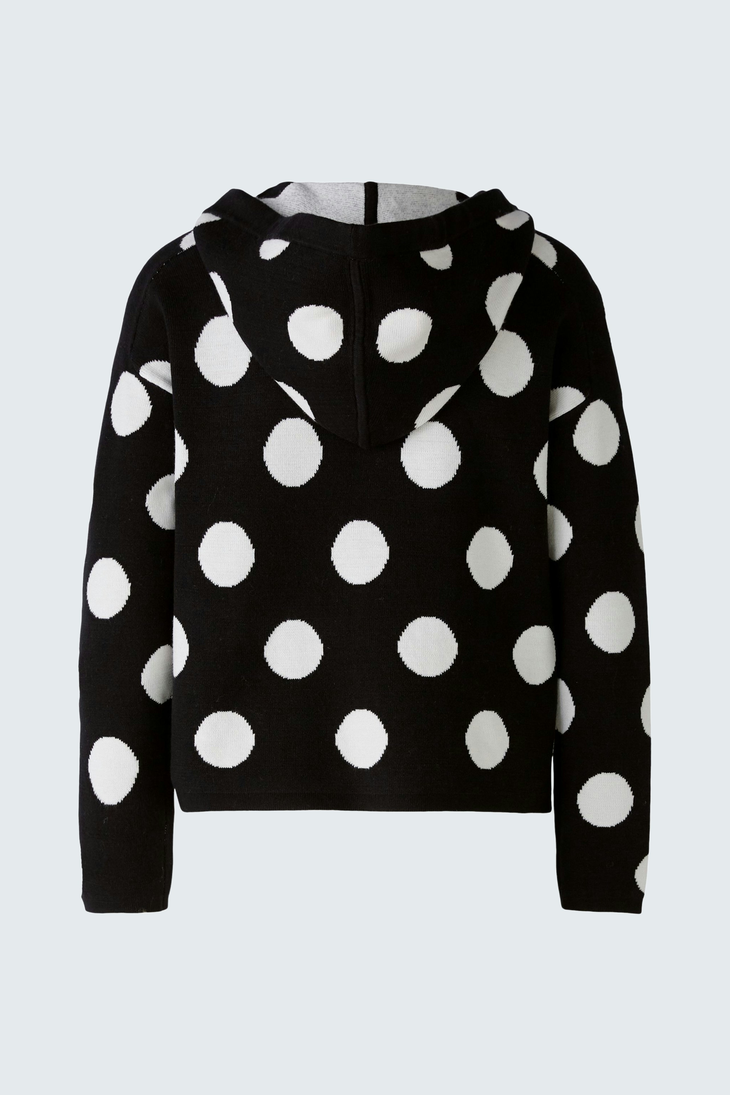 Stylish women's hoodie: Black pullover with white polka dots, perfect for casual wear.
