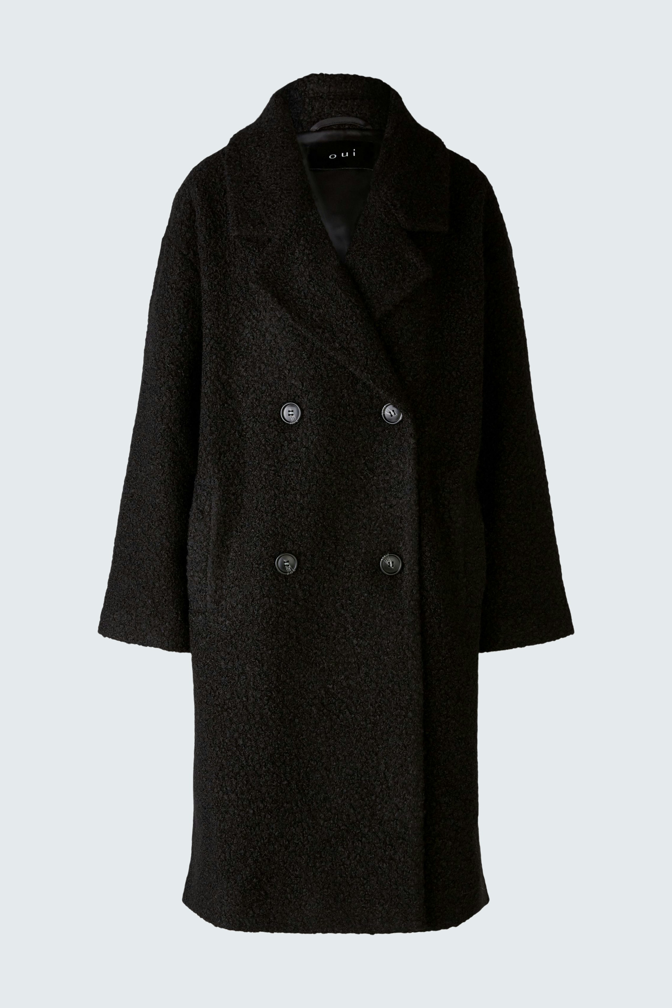 Elegant women's winter coat in black with a double-breasted design and soft texture.