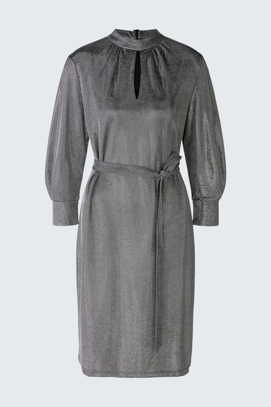 Elegant evening dress: A woman in a stylish gray dress with a belt and puff sleeves, perfect for special occasions.