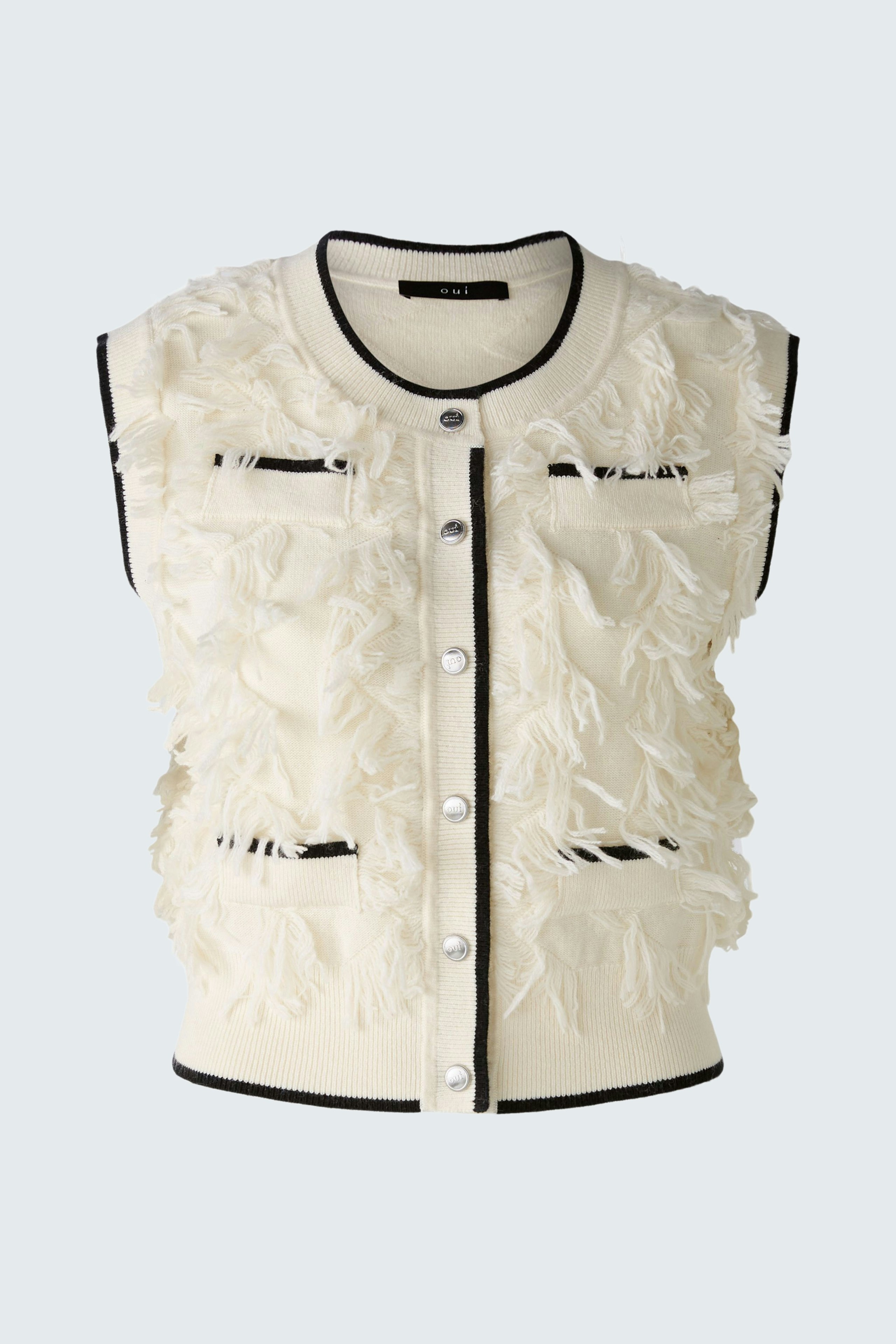 Moderne Damen-Weste: Weiße Weste mit fransigen Details und Knöpfen, ideal für lässige Outfits.