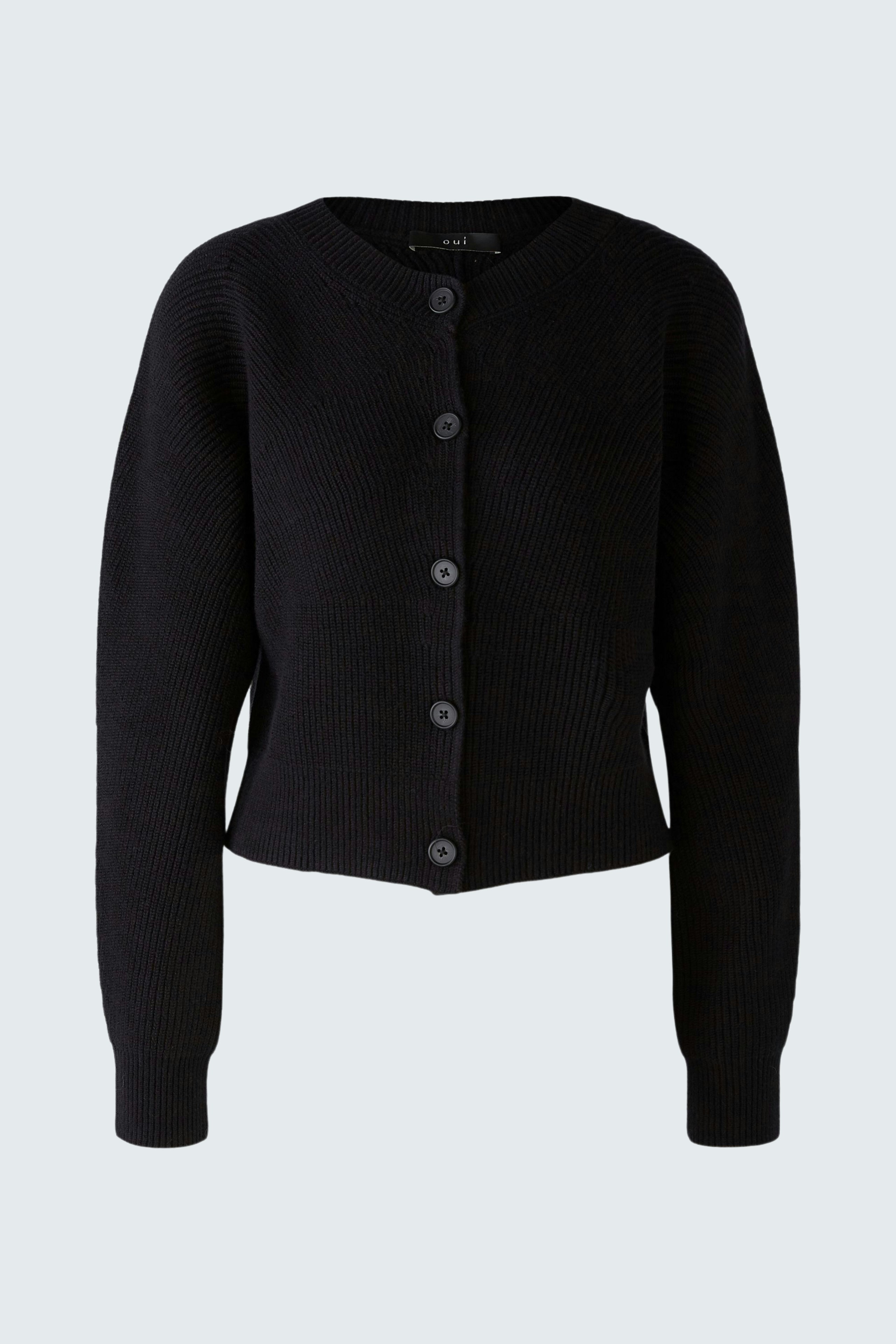 Stylish women's jacket: Black ribbed jacket with buttons, perfect for layering.