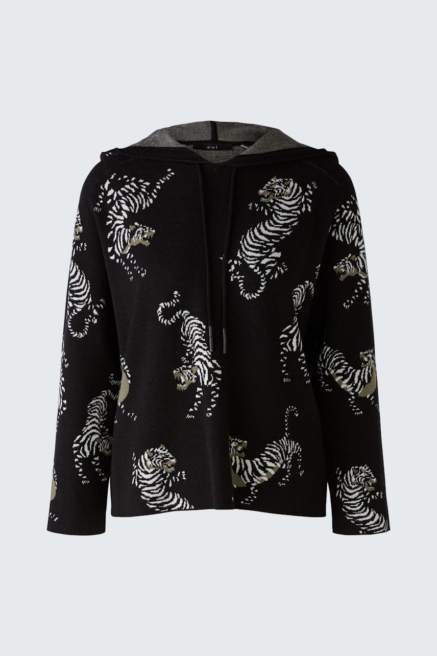 Stylish women's hoodie featuring a bold tiger print, perfect for a casual look.