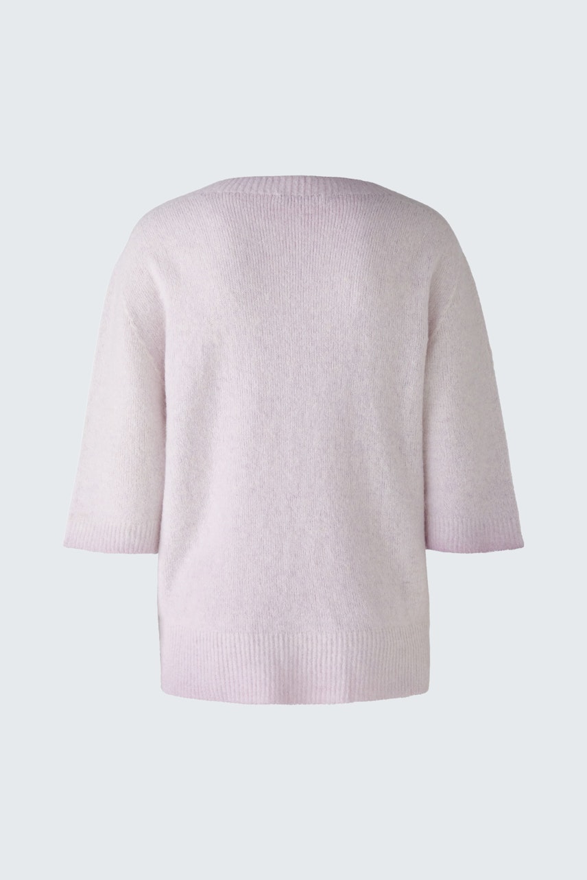 Soft pink pullover with short sleeves, perfect for a casual yet stylish look.