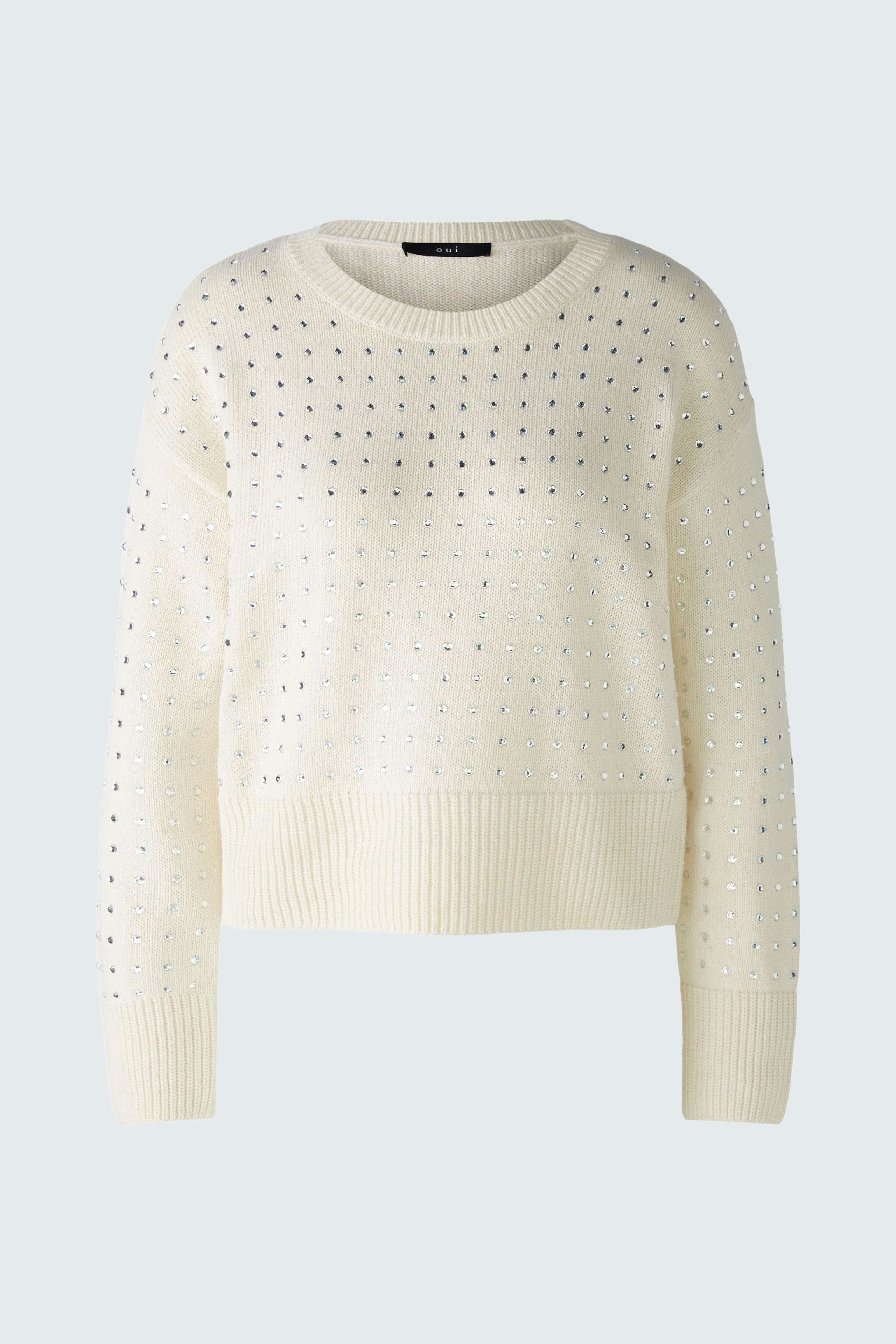 Stylish women's pullover in cream with subtle embellishments, perfect for casual outfits.