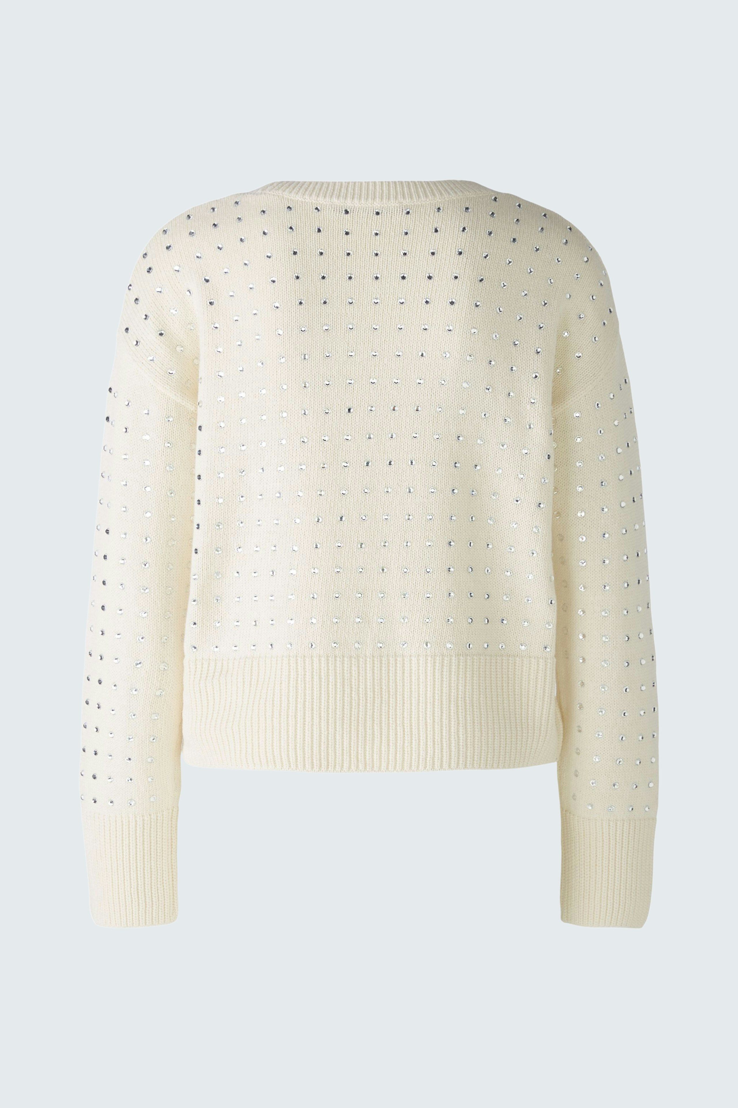 Stylish women's pullover: Cream-colored with a textured pattern, perfect for casual wear.