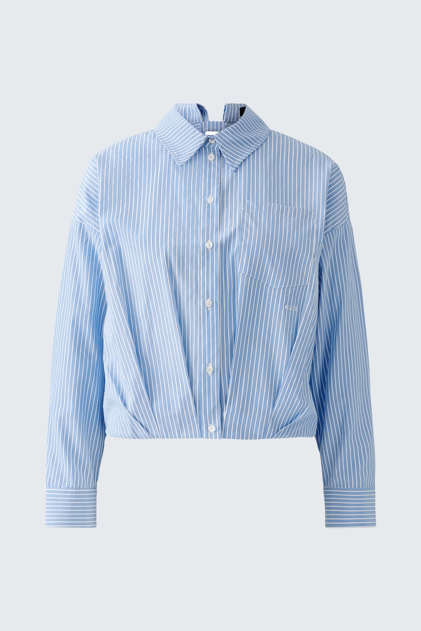 Stylish women's blouse: Light blue striped blouse with a modern cropped fit and button-down collar.