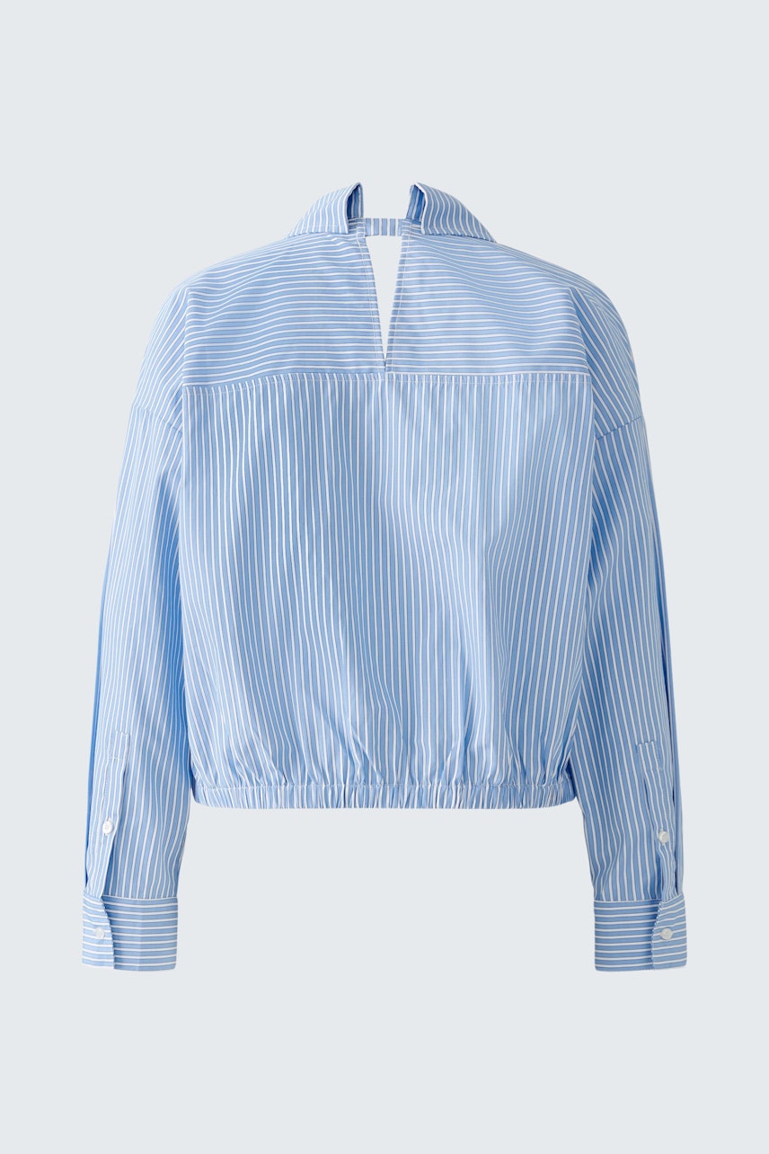 Stylish women's blouse: Light blue striped design with a cropped fit and unique collar detail.