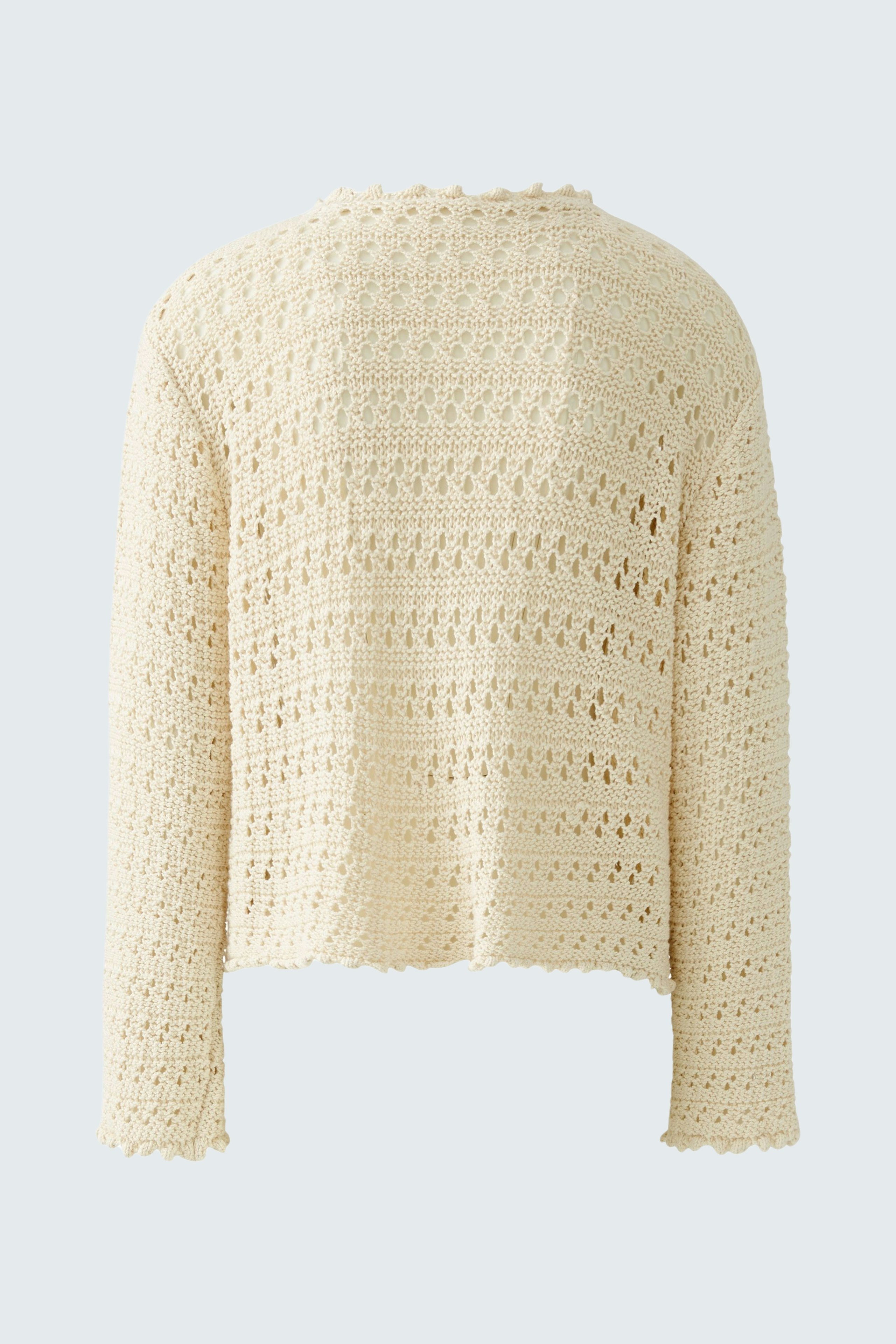 Stylish women's pullover: Cream-colored, textured knit with a relaxed fit and long sleeves.