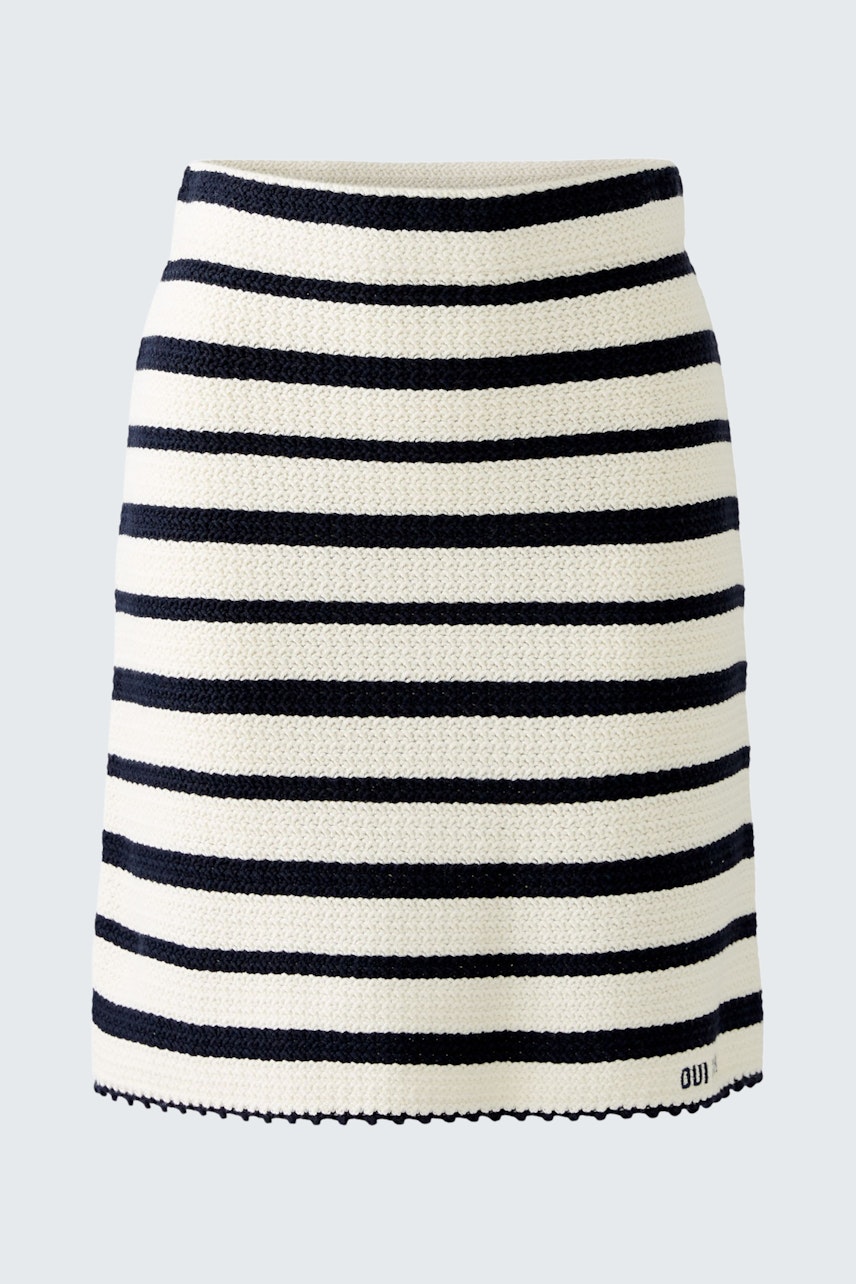 Stylish women's knitted skirt in navy and white stripes, perfect for casual outings.