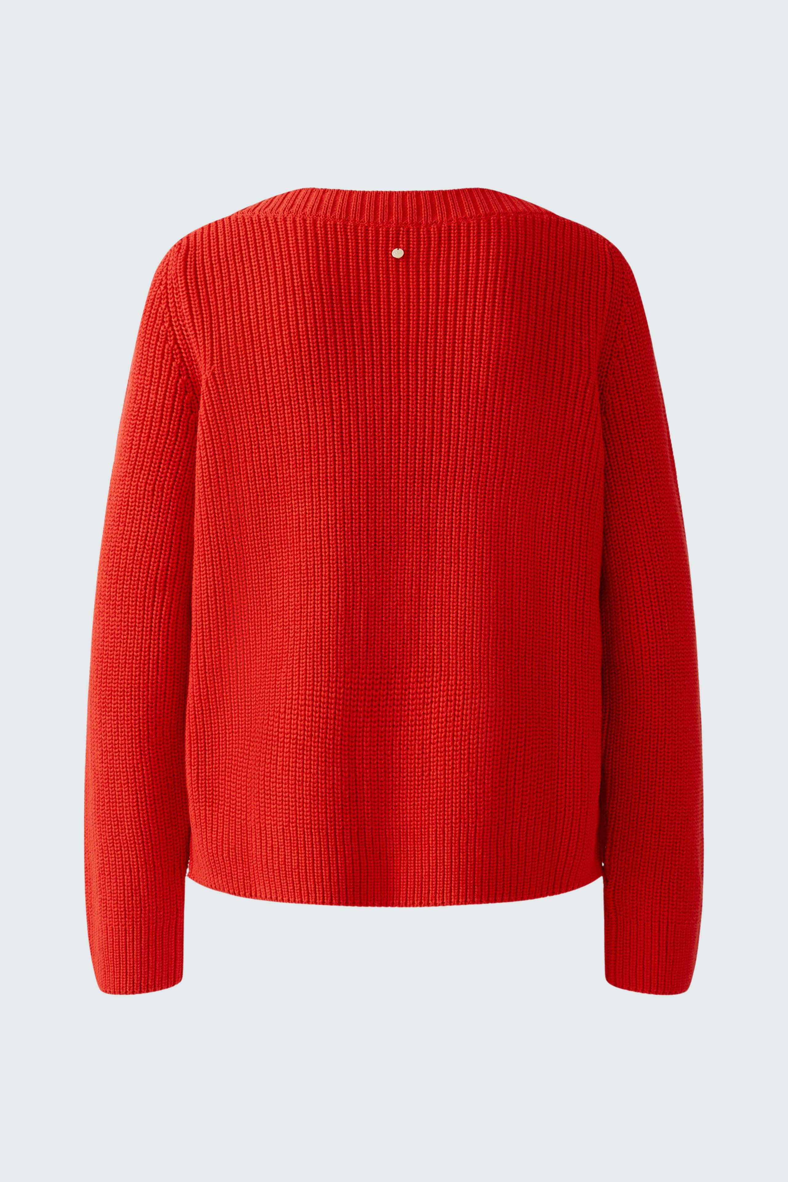 Cozy red pullover: A stylish women's pullover with a ribbed texture, perfect for casual wear.