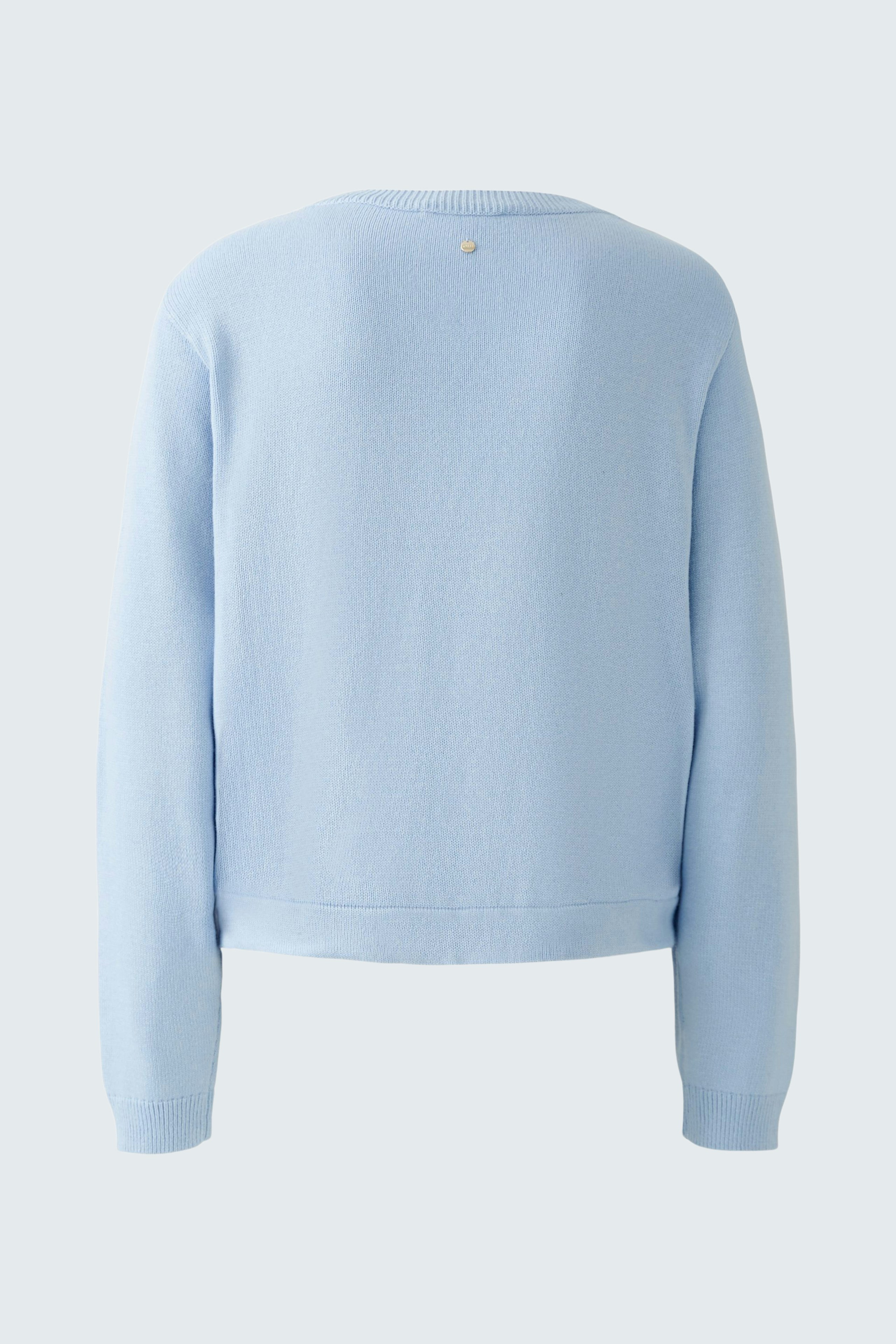 Light blue pullover: A cozy women's pullover with a simple design, perfect for casual wear.