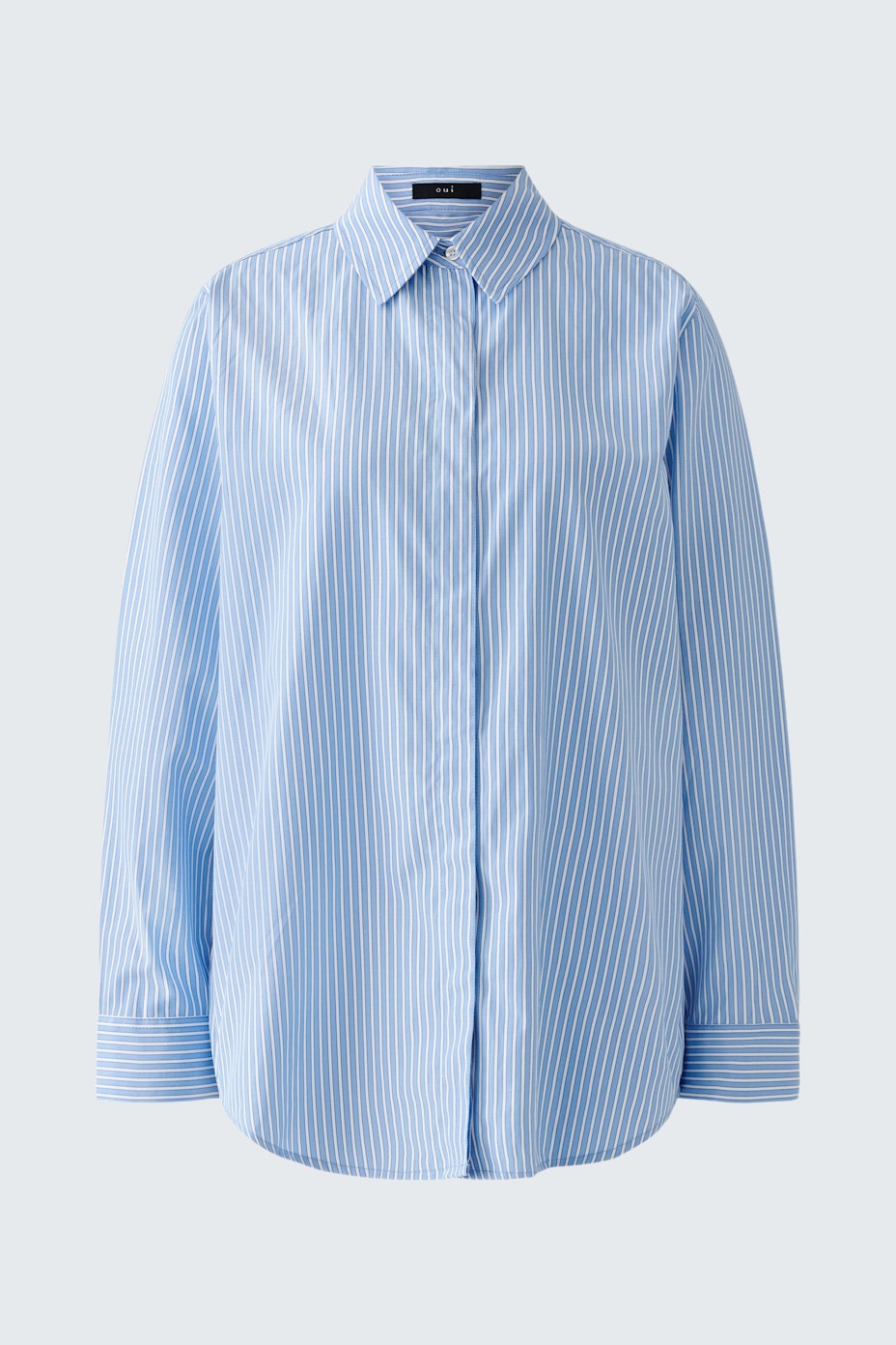 Stylish women's blouse: A light blue striped shirt with a relaxed fit and button-down collar.