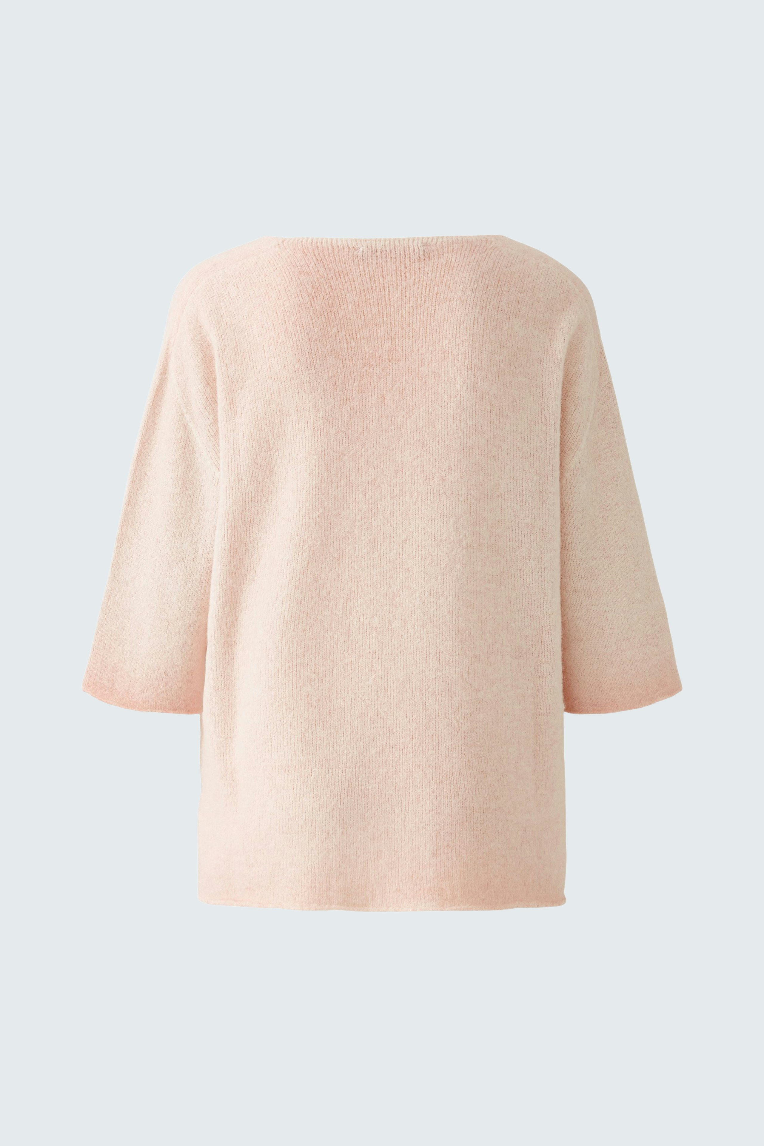 Soft pink pullover: Cozy, oversized design with three-quarter sleeves, perfect for casual wear.