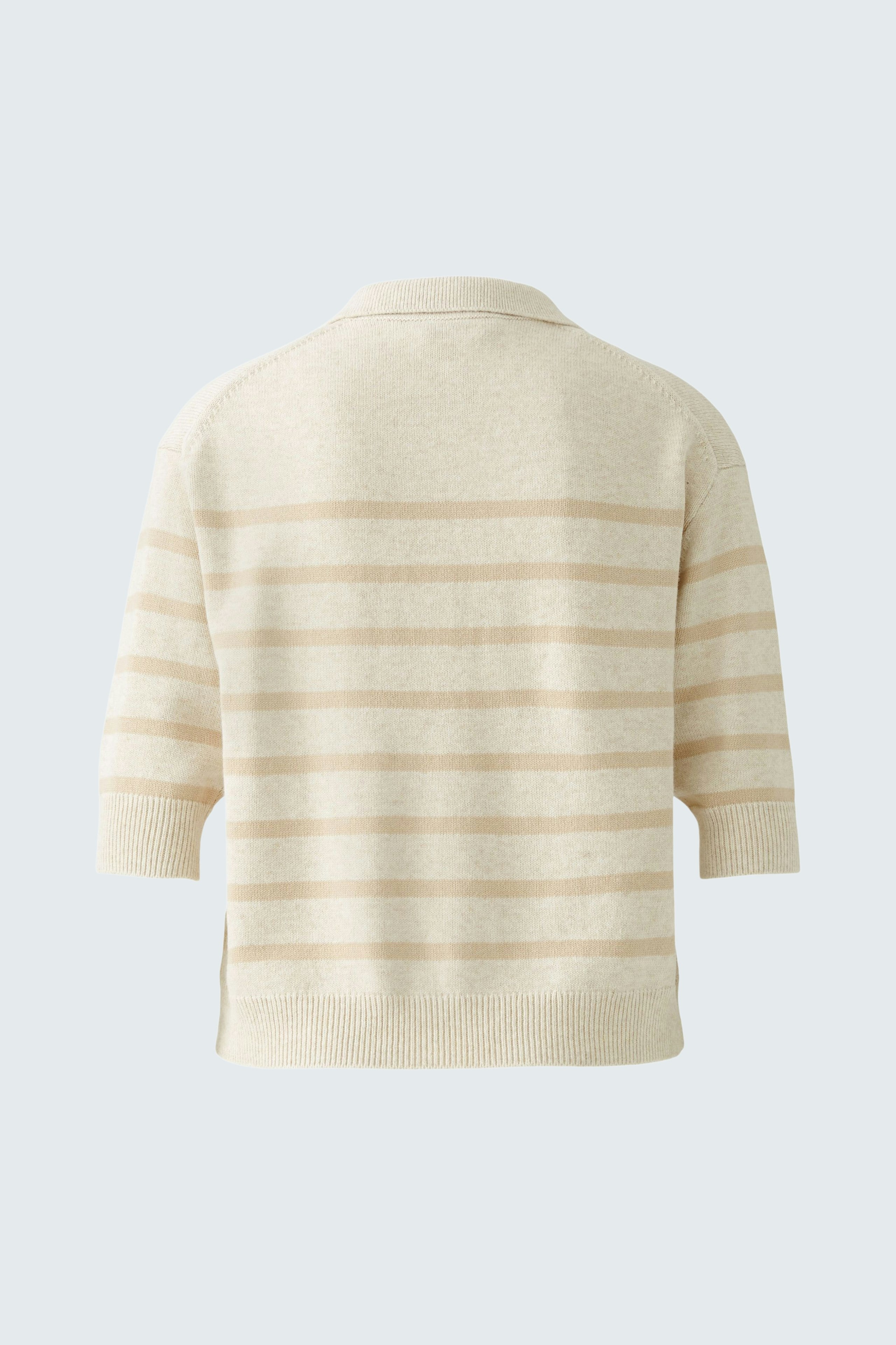 Stylish women's pullover: Cream striped design with a relaxed fit, perfect for casual wear.