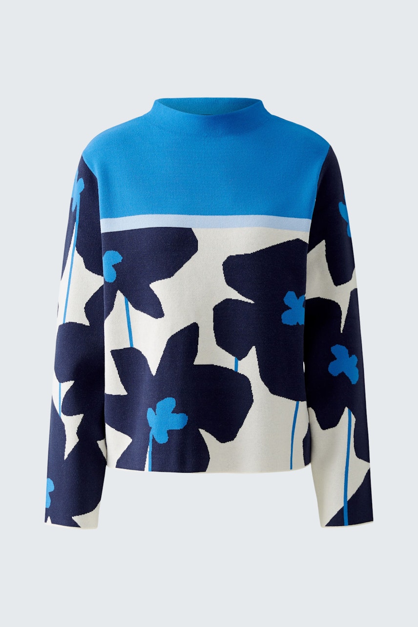 Stylish pullover: A vibrant blue and floral patterned pullover for women, perfect for a chic look.