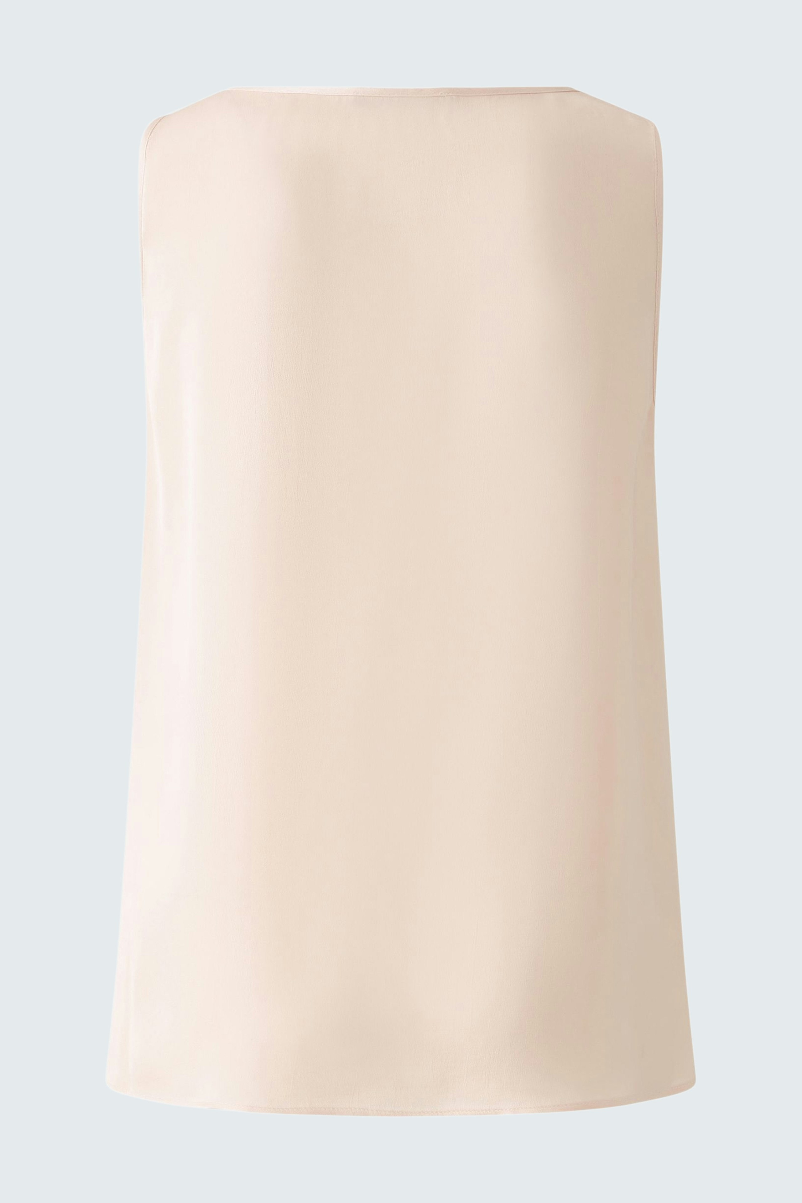 Elegant women's top: A sleek, strapless design in soft beige, perfect for versatile styling.