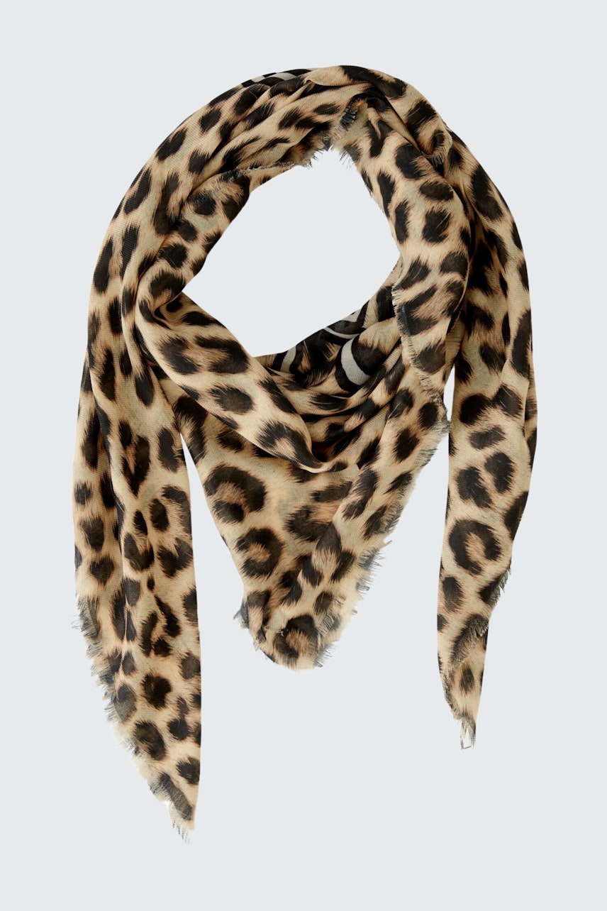 Stylish women's scarf in a trendy leopard print, perfect for adding flair to any outfit.