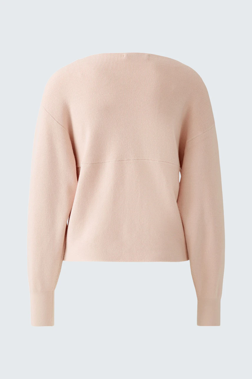 Soft pink pullover: A stylish women's pullover with a relaxed fit and long sleeves.