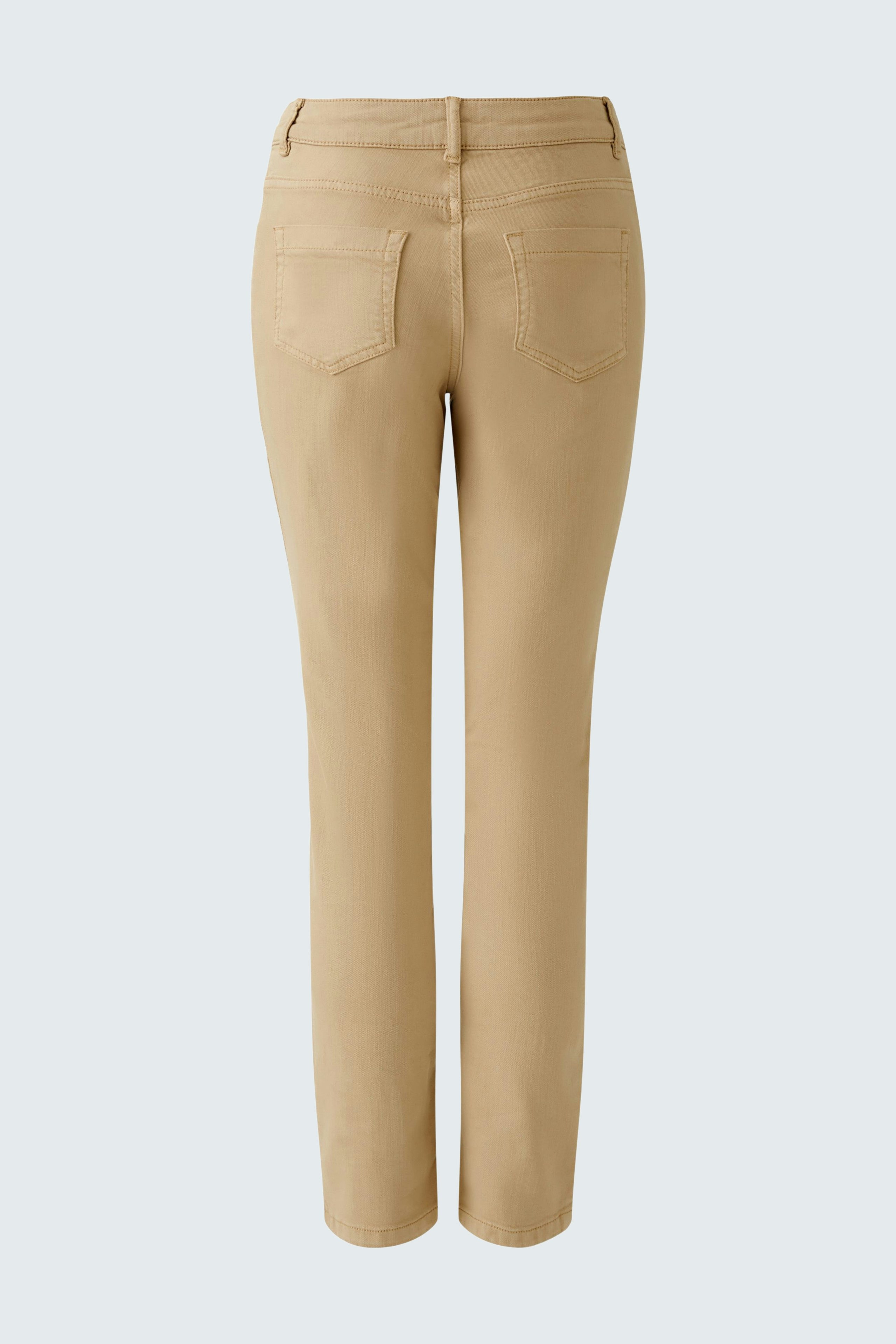 Stylish women's jeggings in a light beige color, featuring a sleek design and comfortable fit.