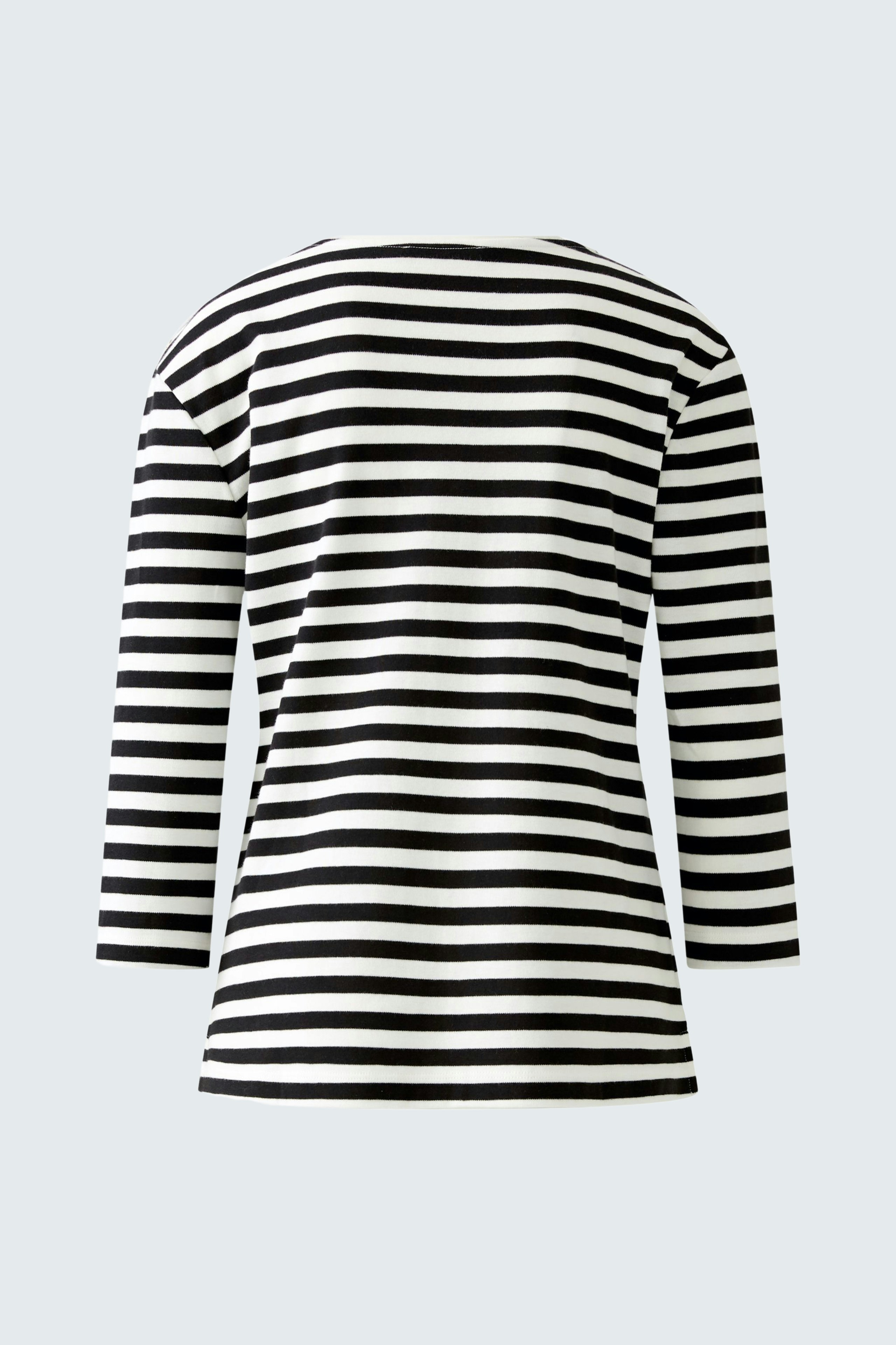 Stylish women's long-sleeve shirt: Black and white striped design with a relaxed fit.