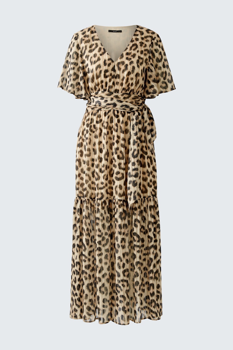 Elegant maxi dress: A woman in a stylish leopard print dress with a flattering silhouette.