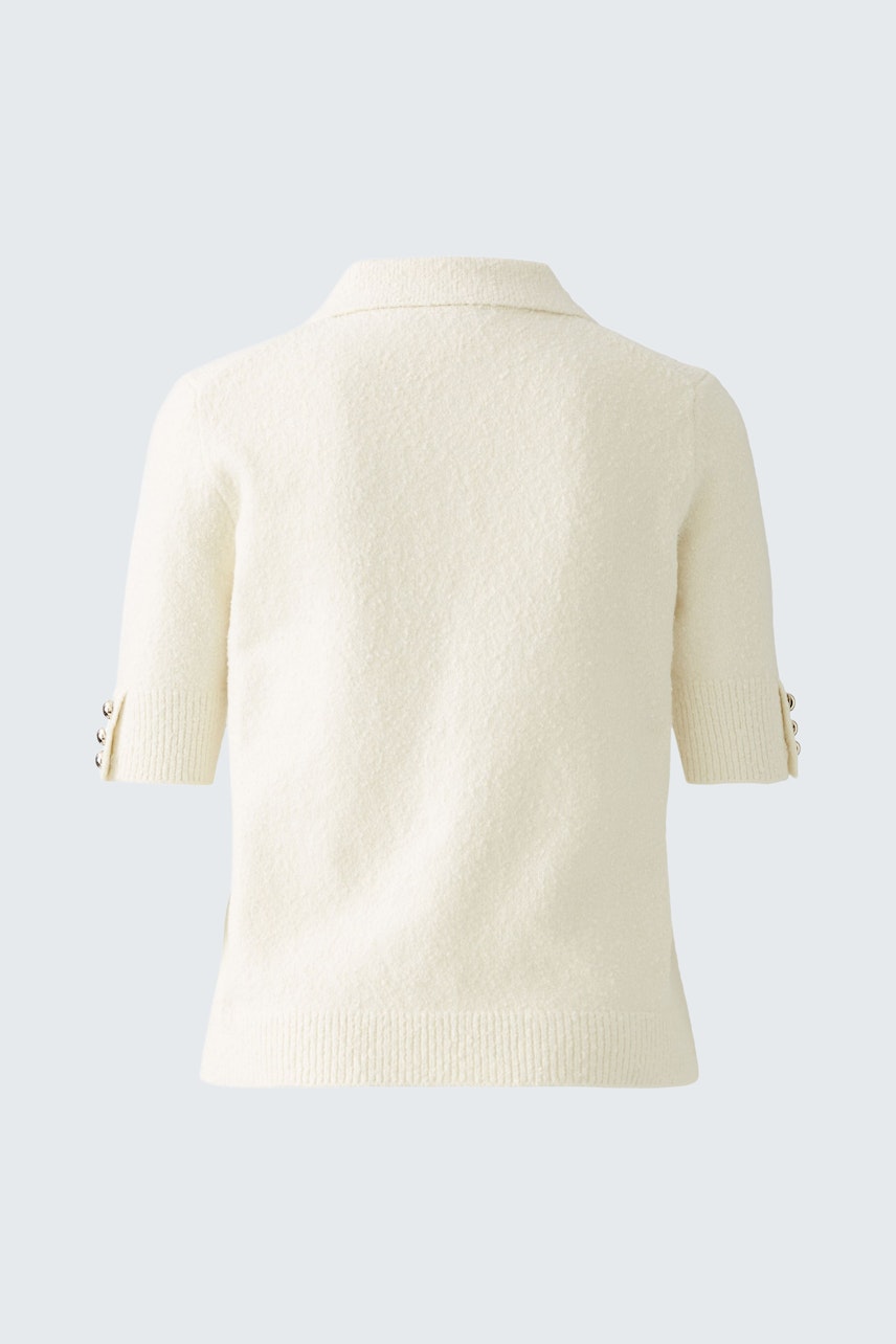 Eleganter Damen-Pullover in Creme mit kurzen Ärmeln und feiner Struktur, ideal für lässige Anlässe.