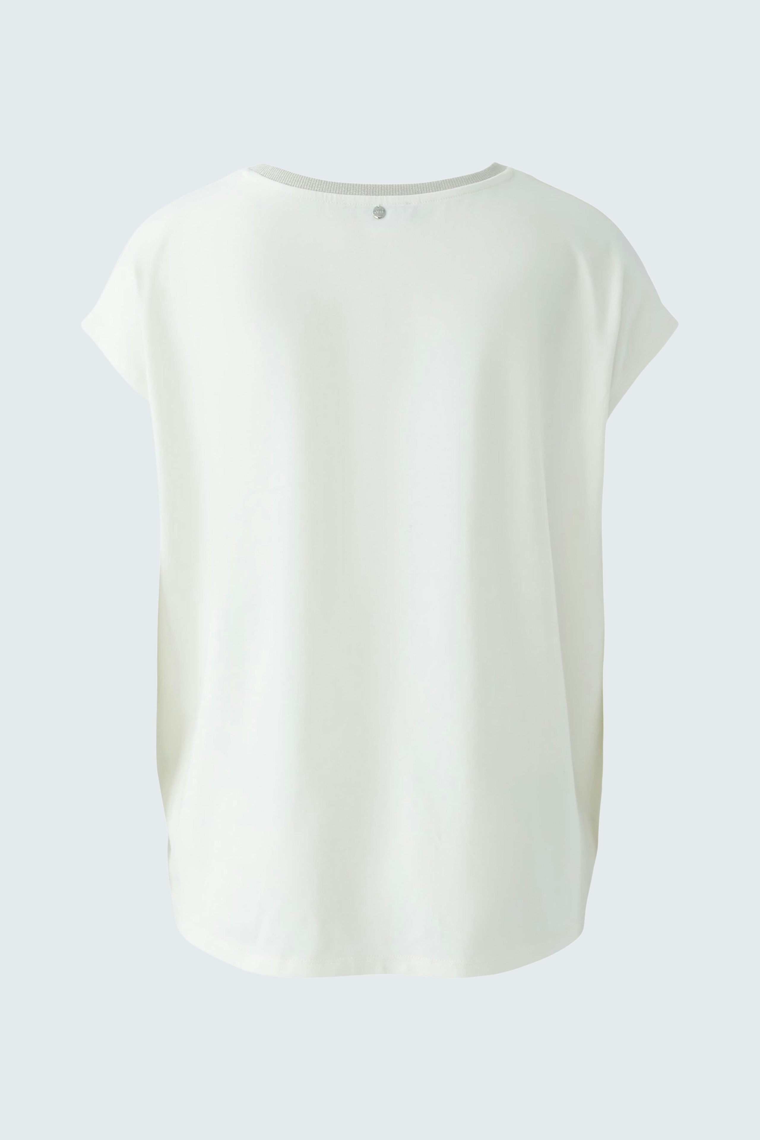 Elegant women's blouse shirt in soft white fabric, featuring a relaxed fit and short sleeves.
