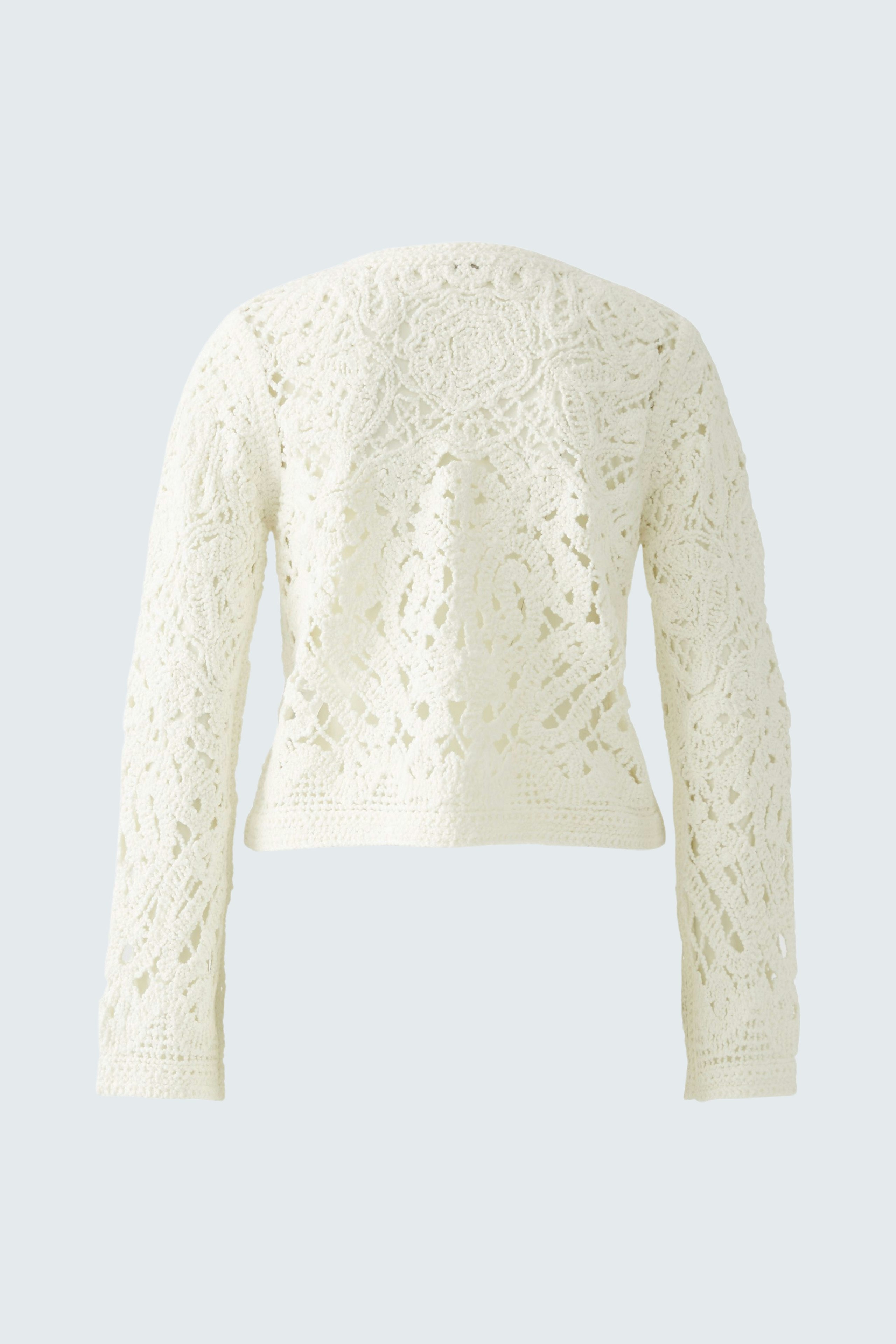 Elegant women's cardigan in white with intricate lace design, perfect for layering.