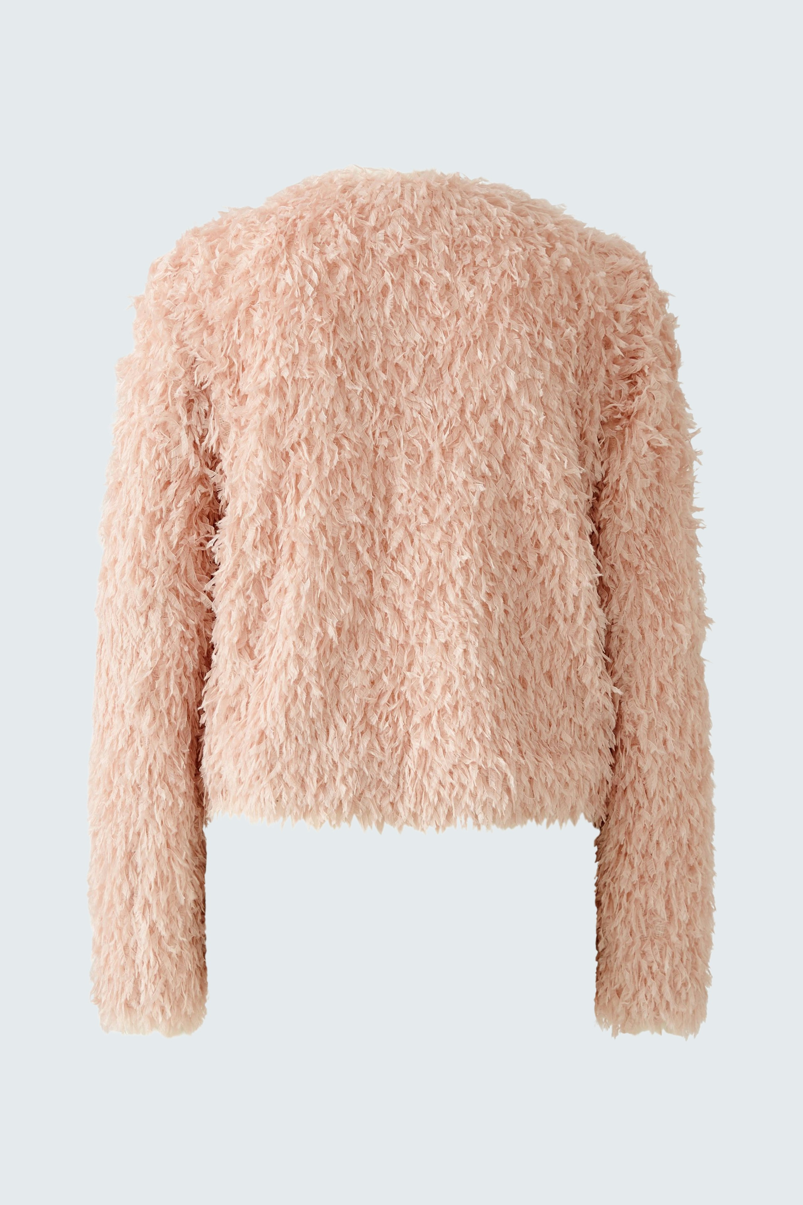 Soft pink women's jacket with a cozy texture, perfect for layering in cooler weather.